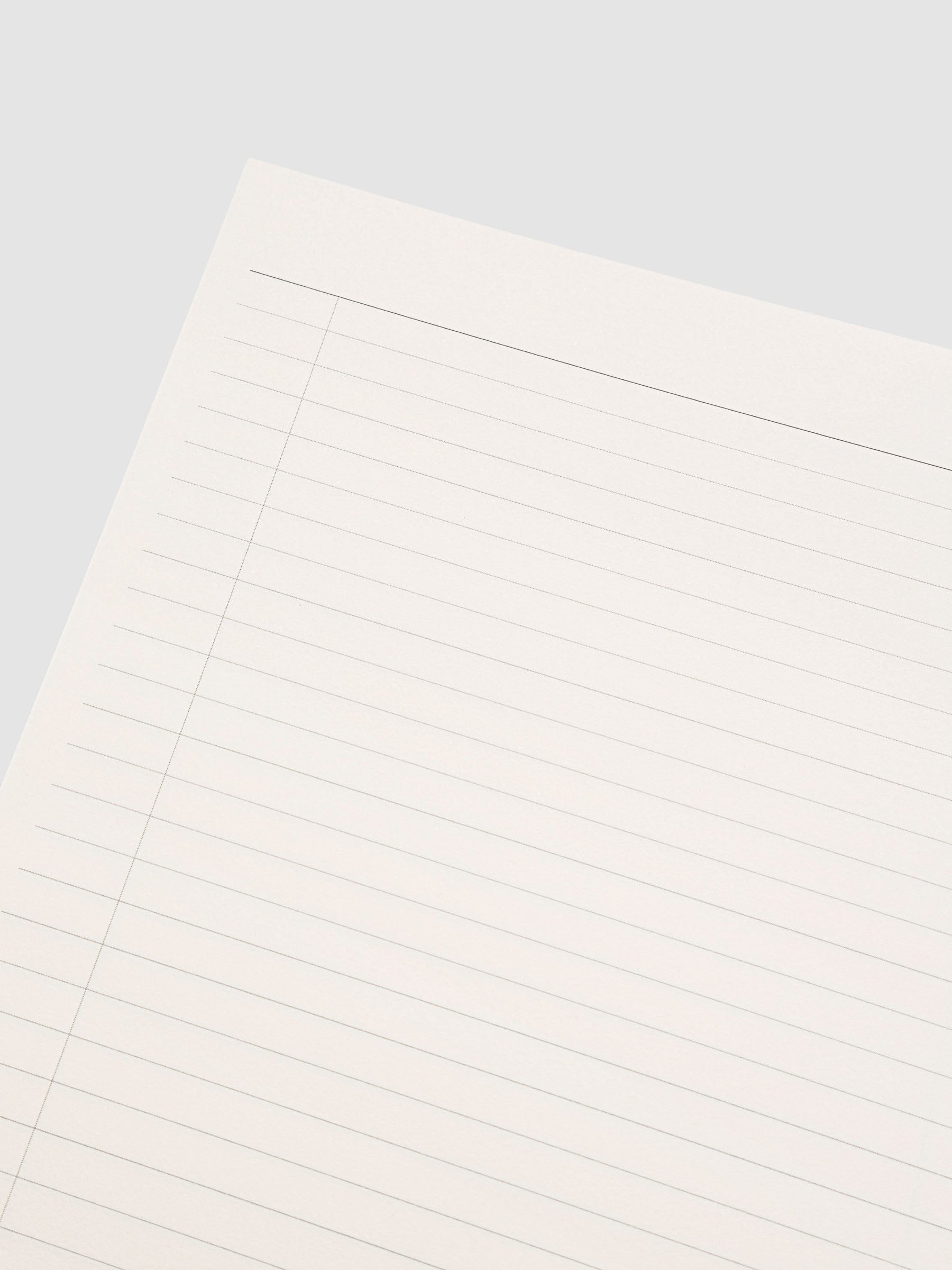 Spiral Notebook in size A5 and color Ristretto beige with Task interior pages shown open and close up.