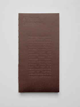 One Common Thread Notebook showing the dark brown cover.