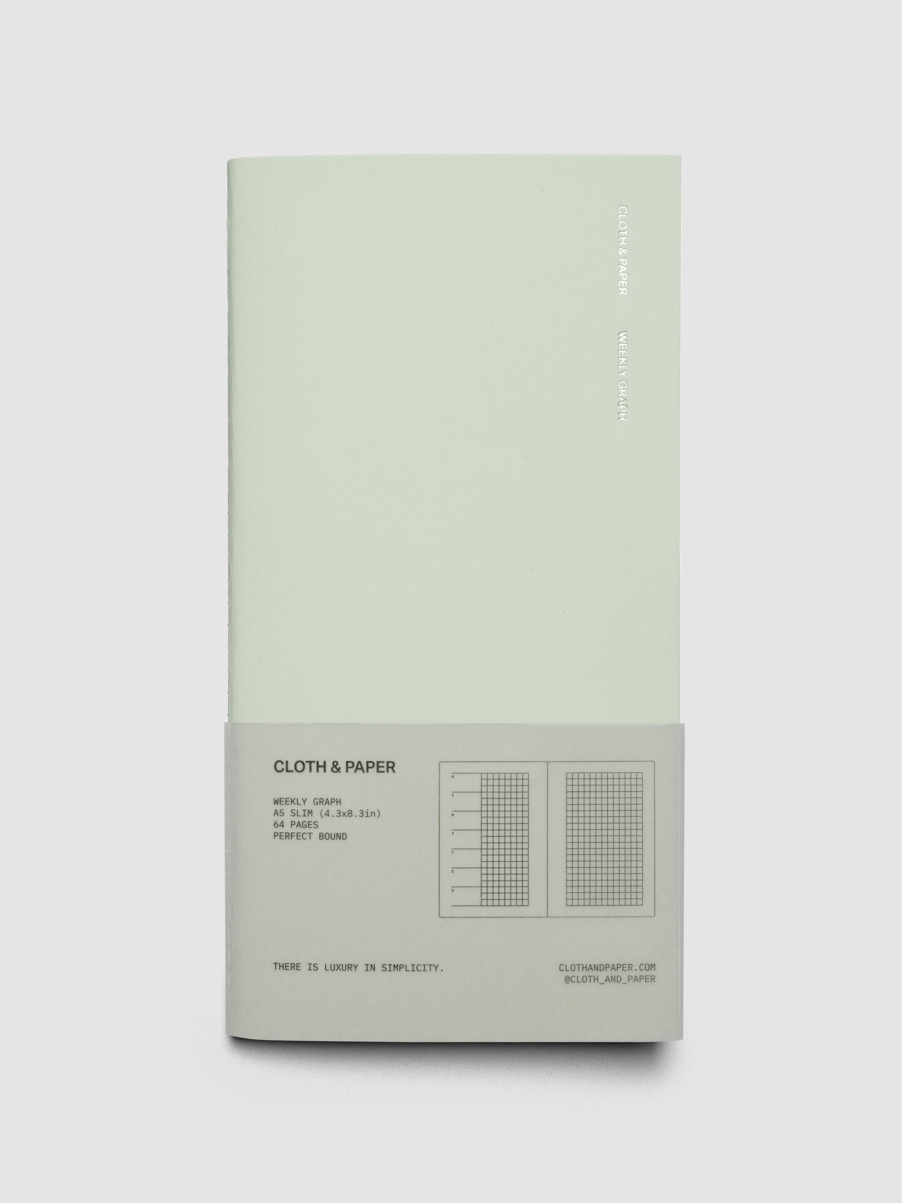 Travel Notebook in size A5 Slim in color Matcha with Weekly Graph pages shown closed in packaging.