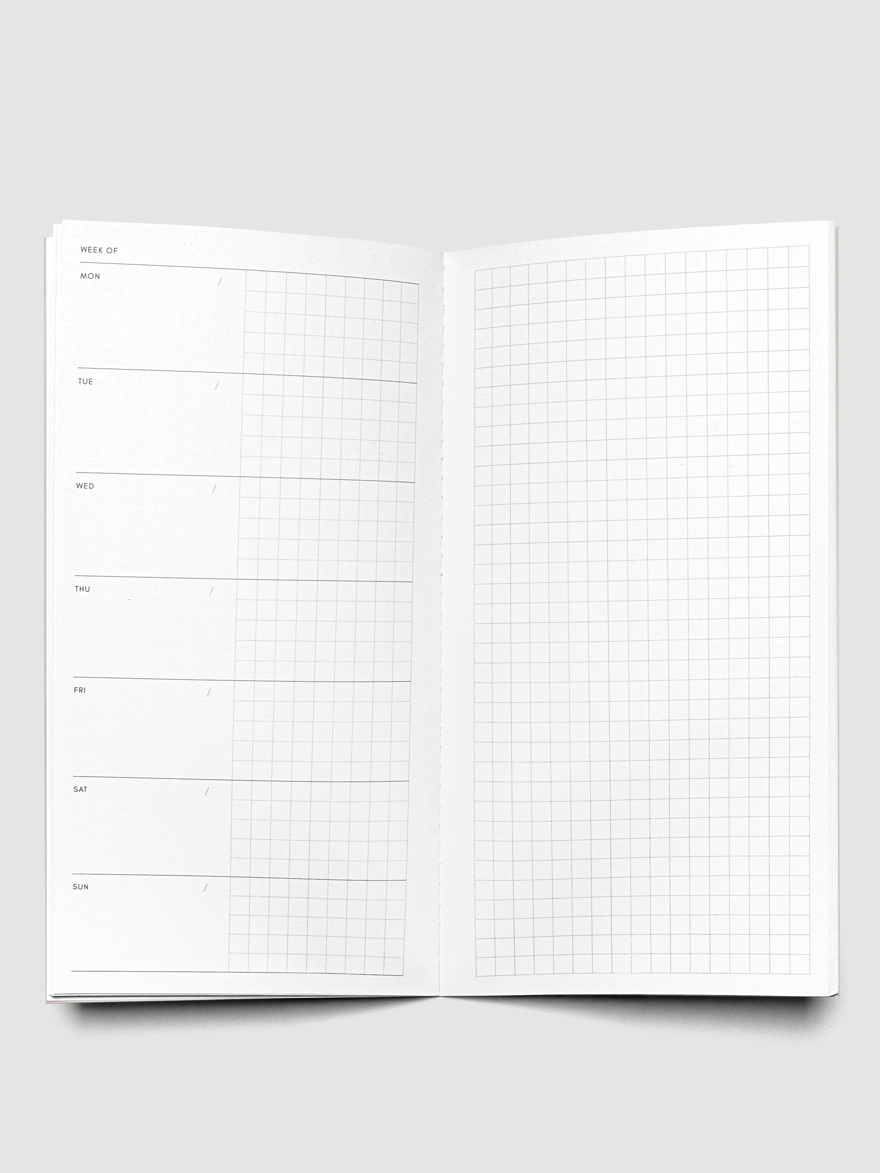 Interior of Travel Notebook in size A5 Slim in color Matcha with Weekly Graph pages.