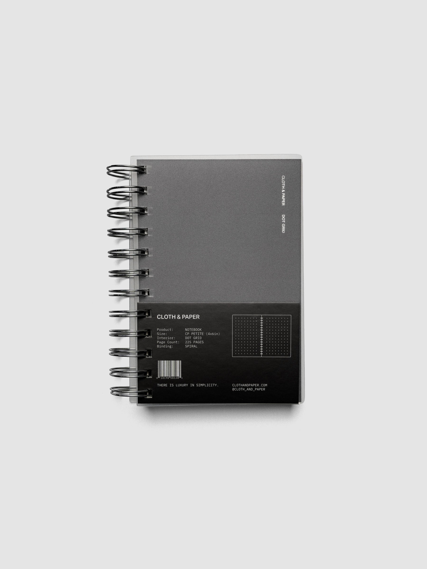 Spiral Notebook in size CP Petite and color Avant Garde with Dot Grid interior pages shown closed from the front with belly band.