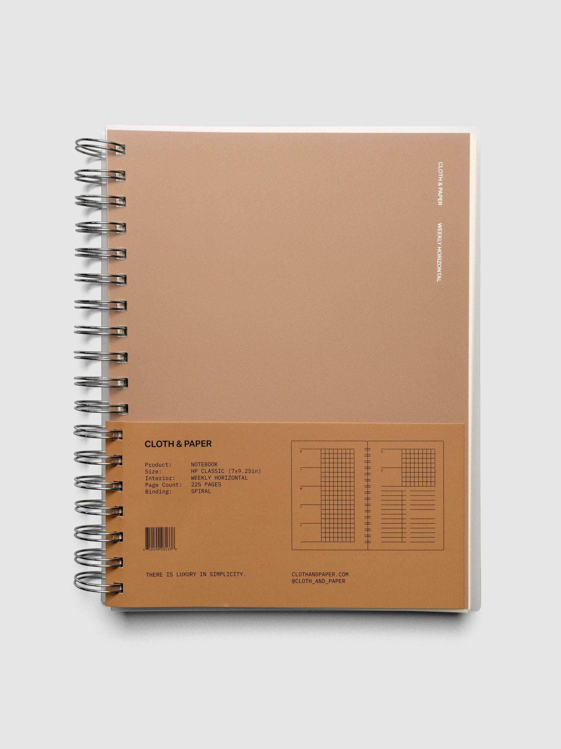 Spiral Notebook in size HP Classic and color Moscow (orange) shown closed with belly band.