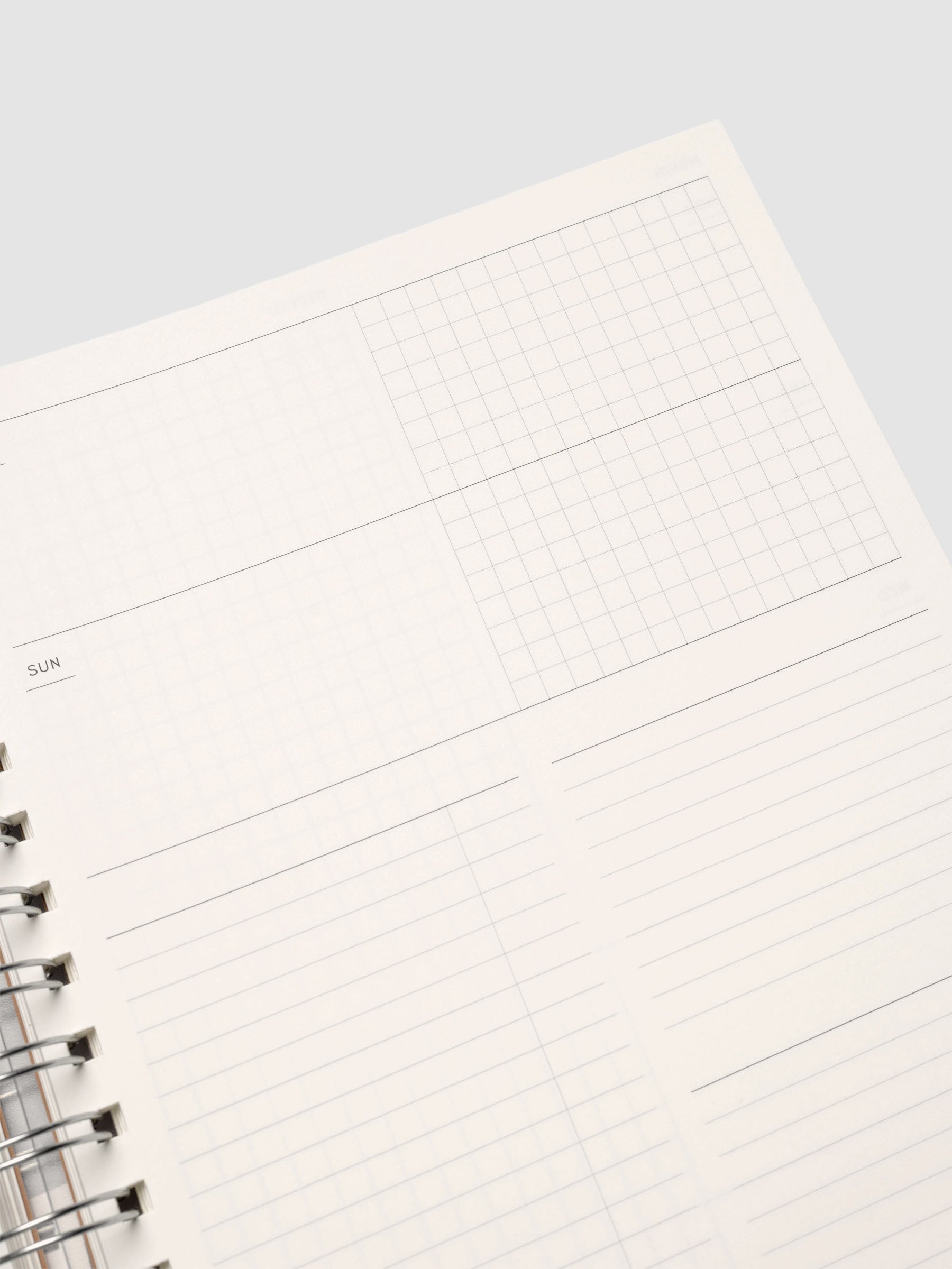 Spiral Notebook in size HP Classic and color Moscow (orange) shown open displaying Weekly Horizontal interior layout.