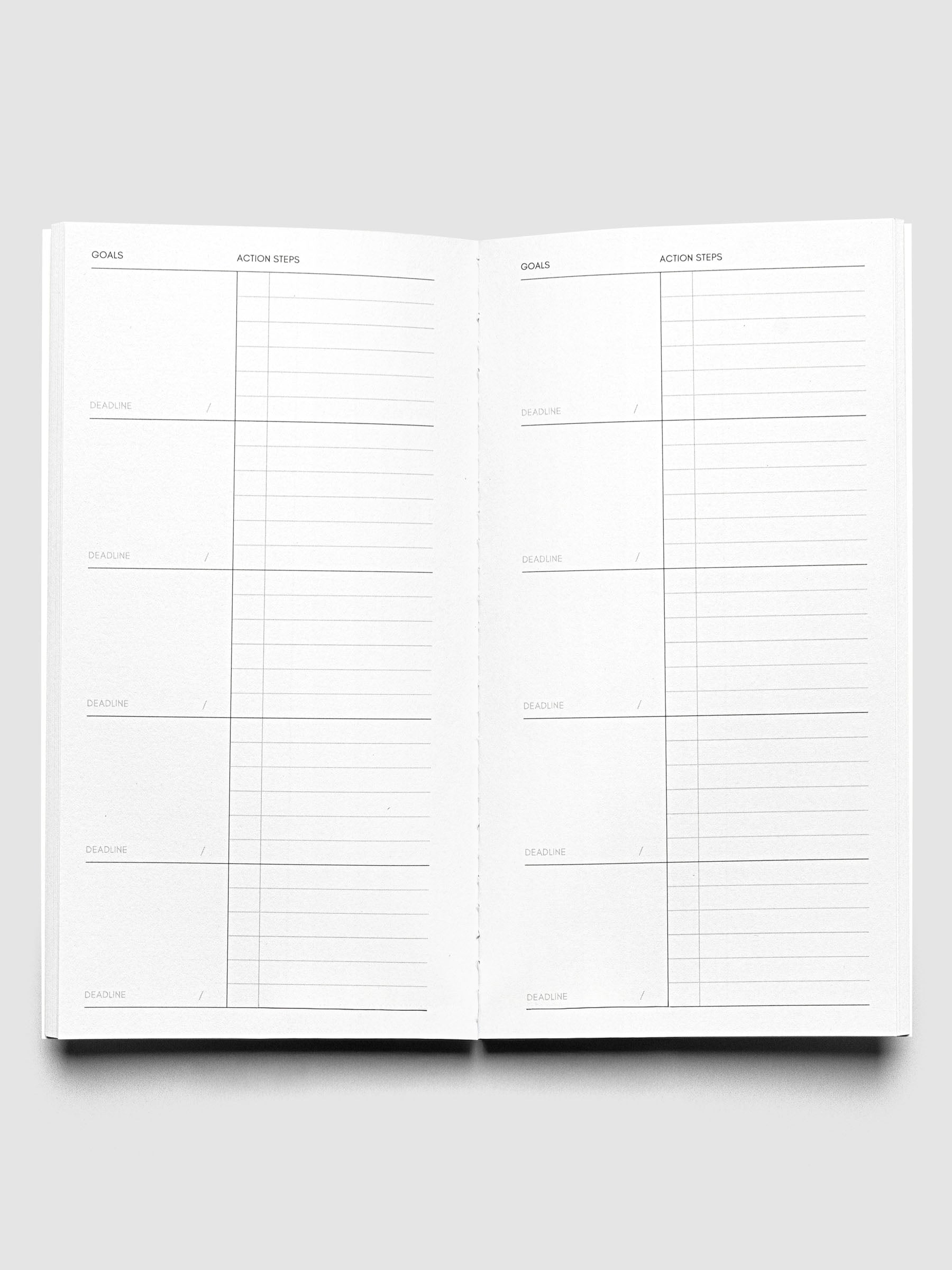 Interior of Travel Notebook in size Pocket Plus in color Ibiza with Goal Tracking pages.