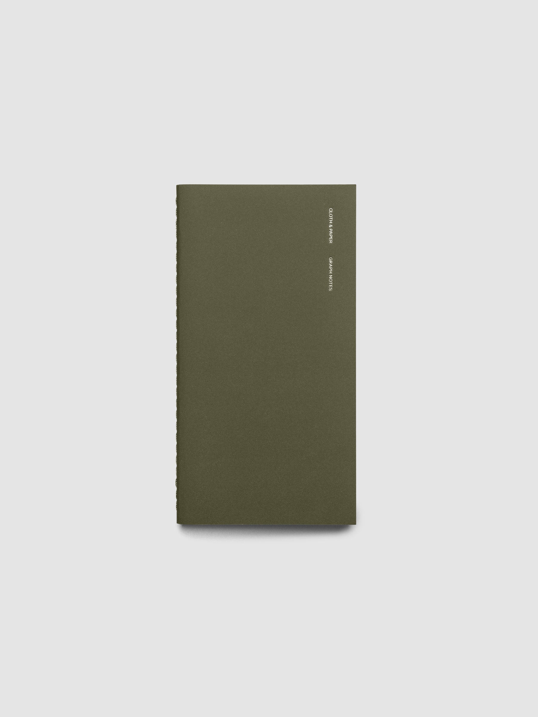 Exterior of a green pocket plus sized travel notebook.
