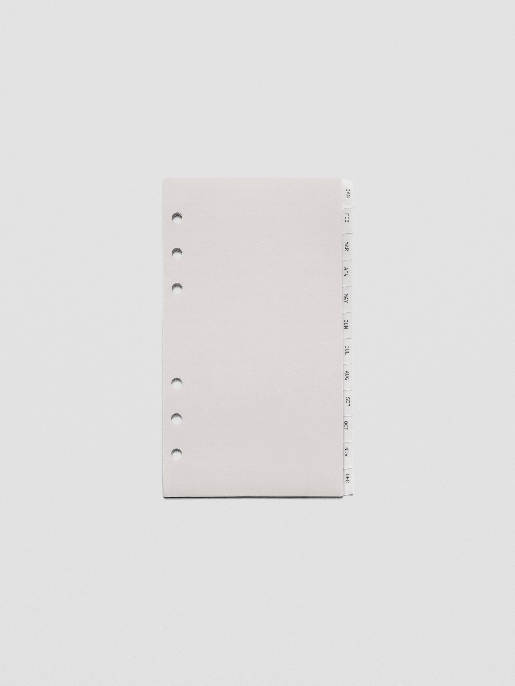 Personal vellum dividers shown on a grey background.