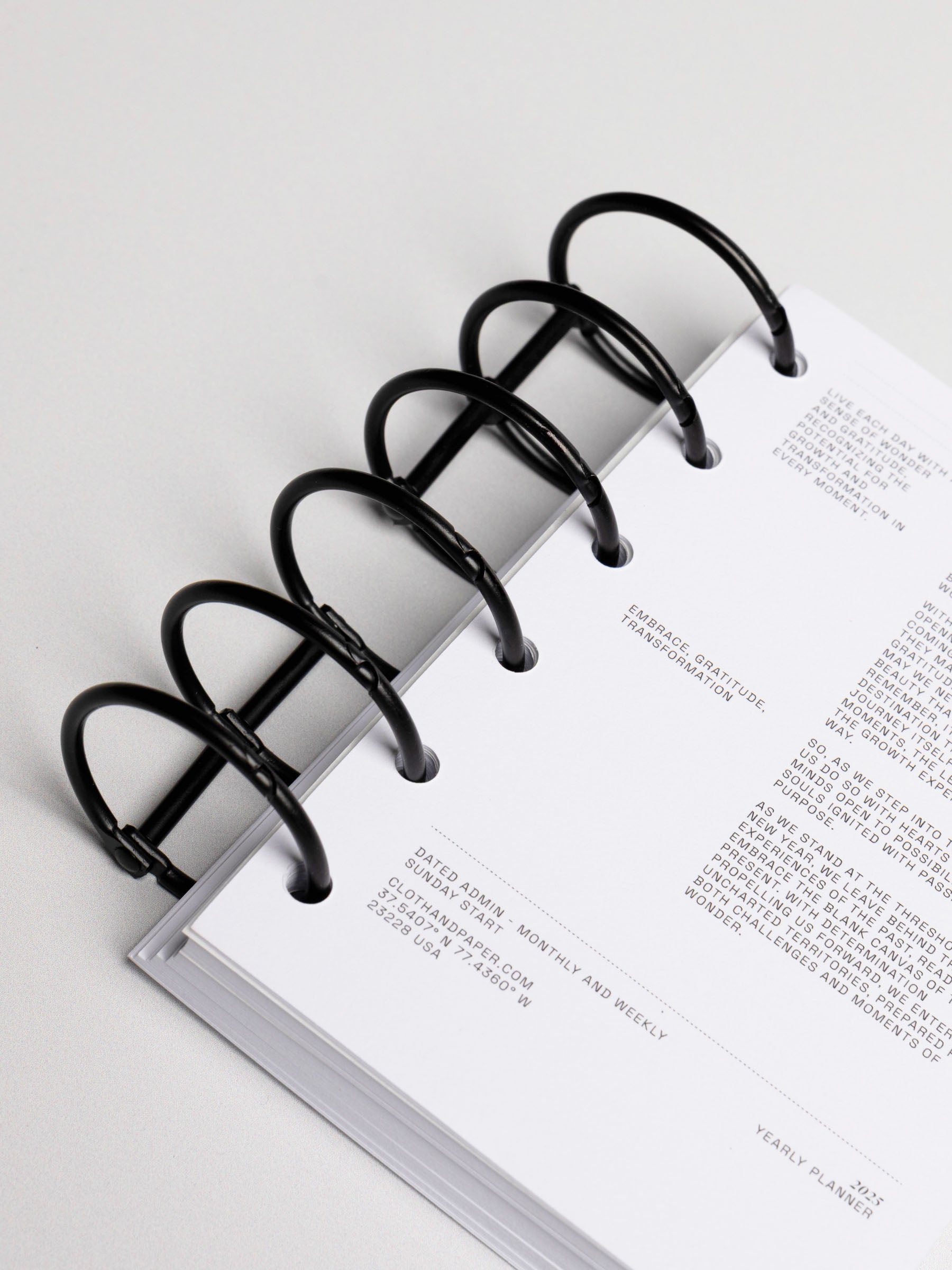 Planner rings displayed in a planner system on a neutral background. Color shown is black.