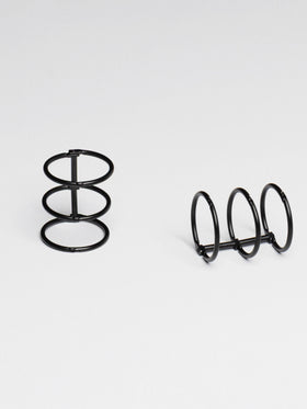 Planner rings displayed on a neutral background. Color shown is black.
