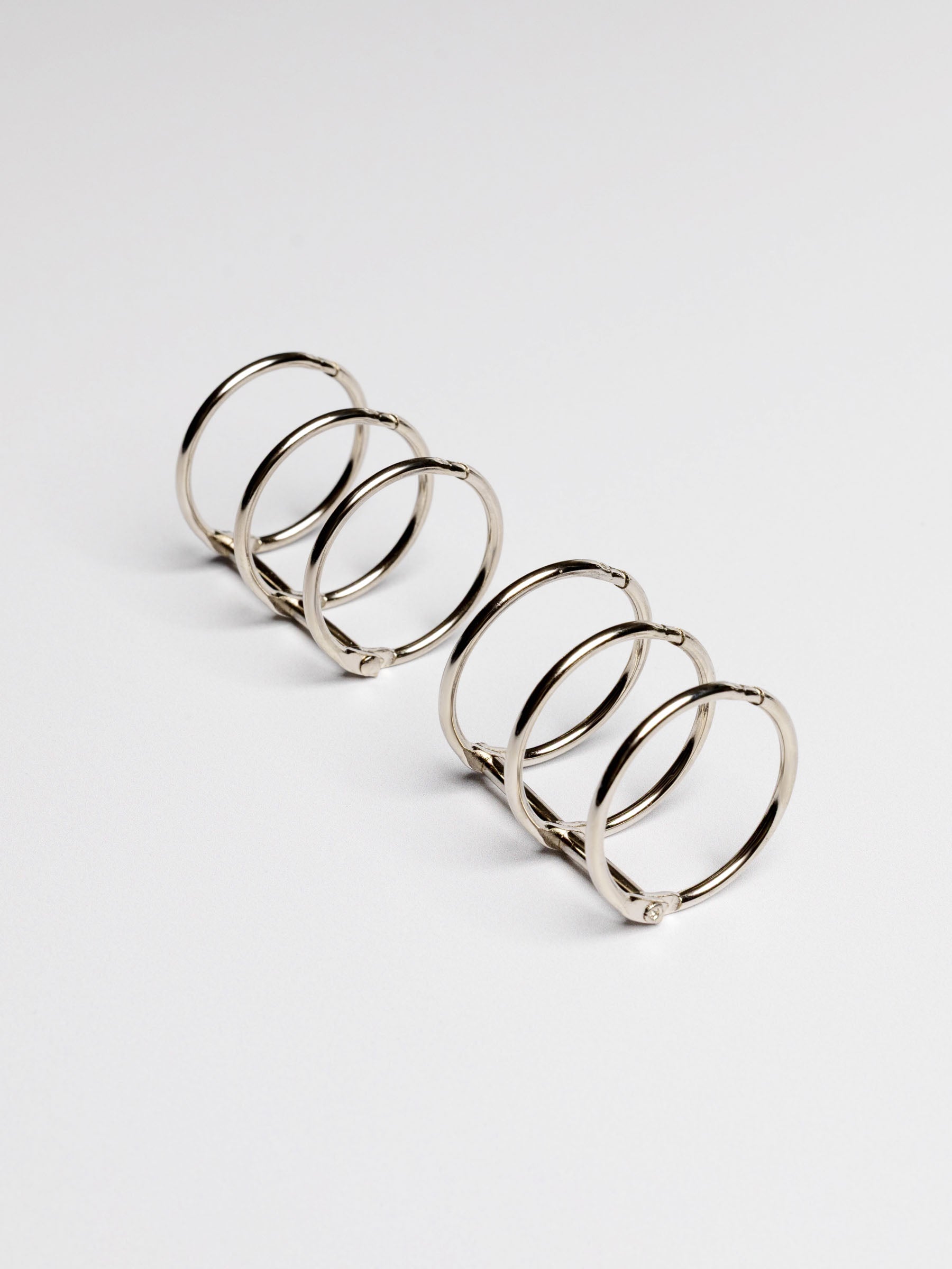 Planner rings displayed on a neutral background. Color shown is silver.