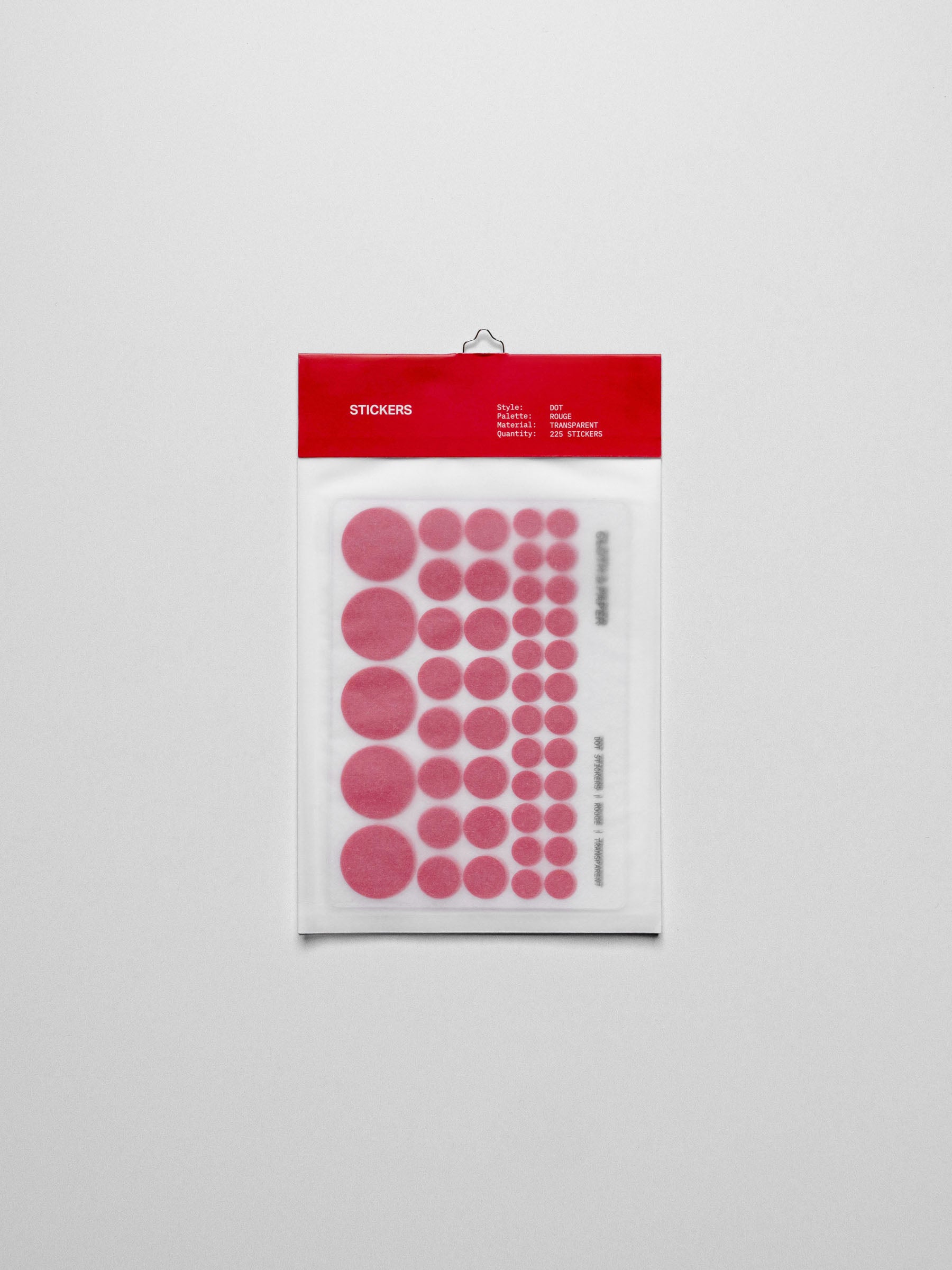 Red dot stickers in its packaging