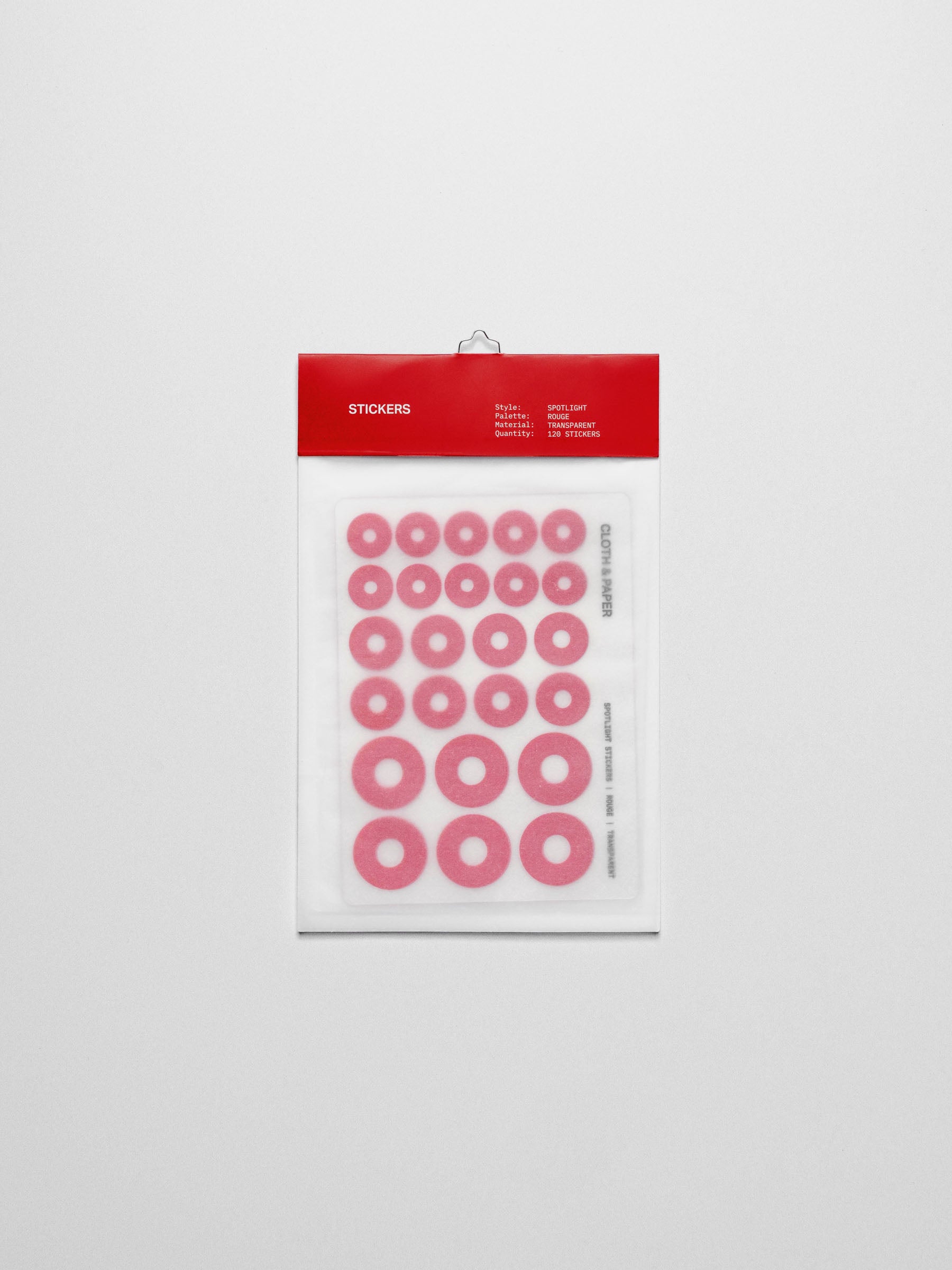 Red spotlight stickers in its translucent packaging