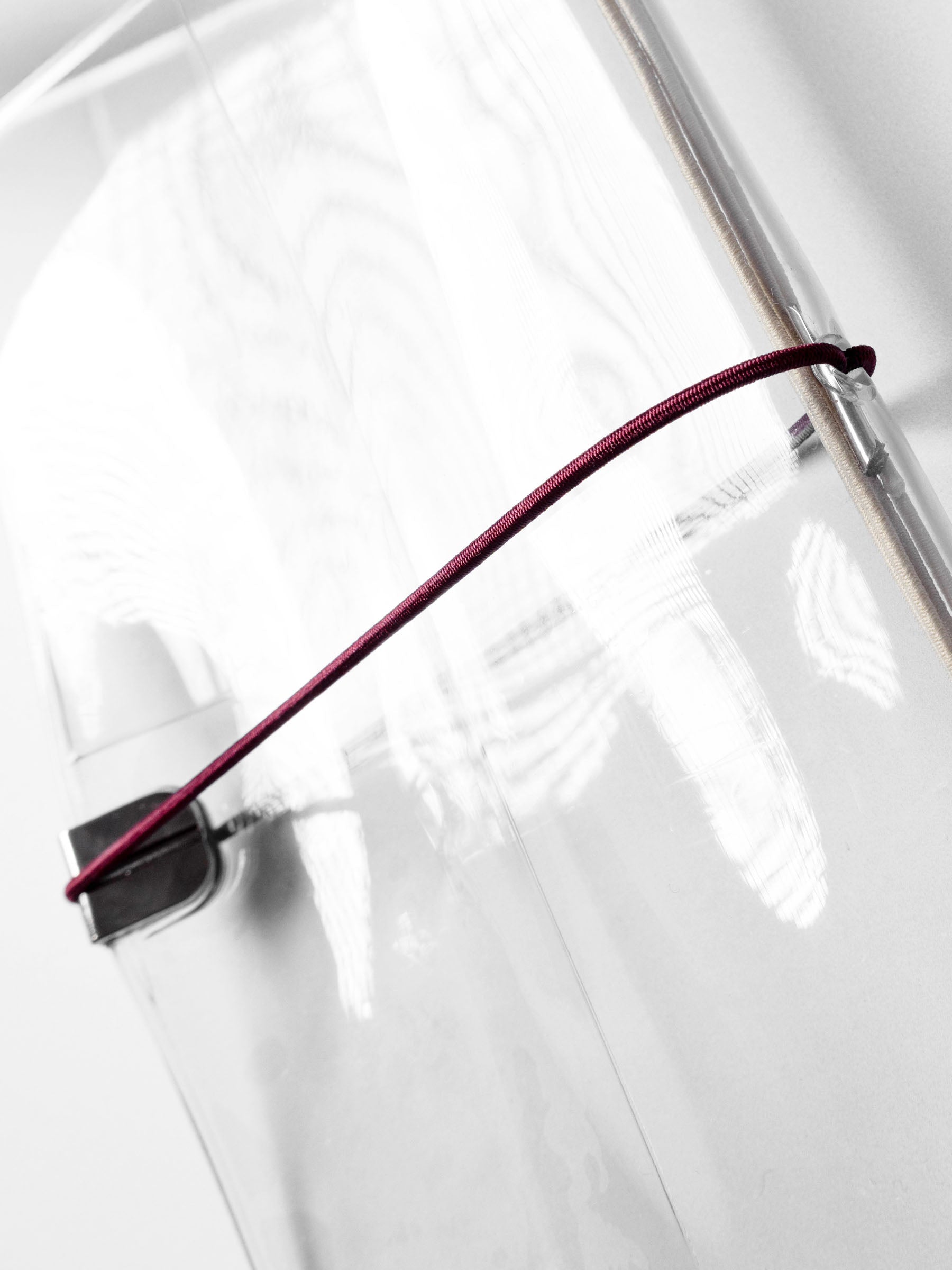 Red cover band in use on an A5 clear cover.