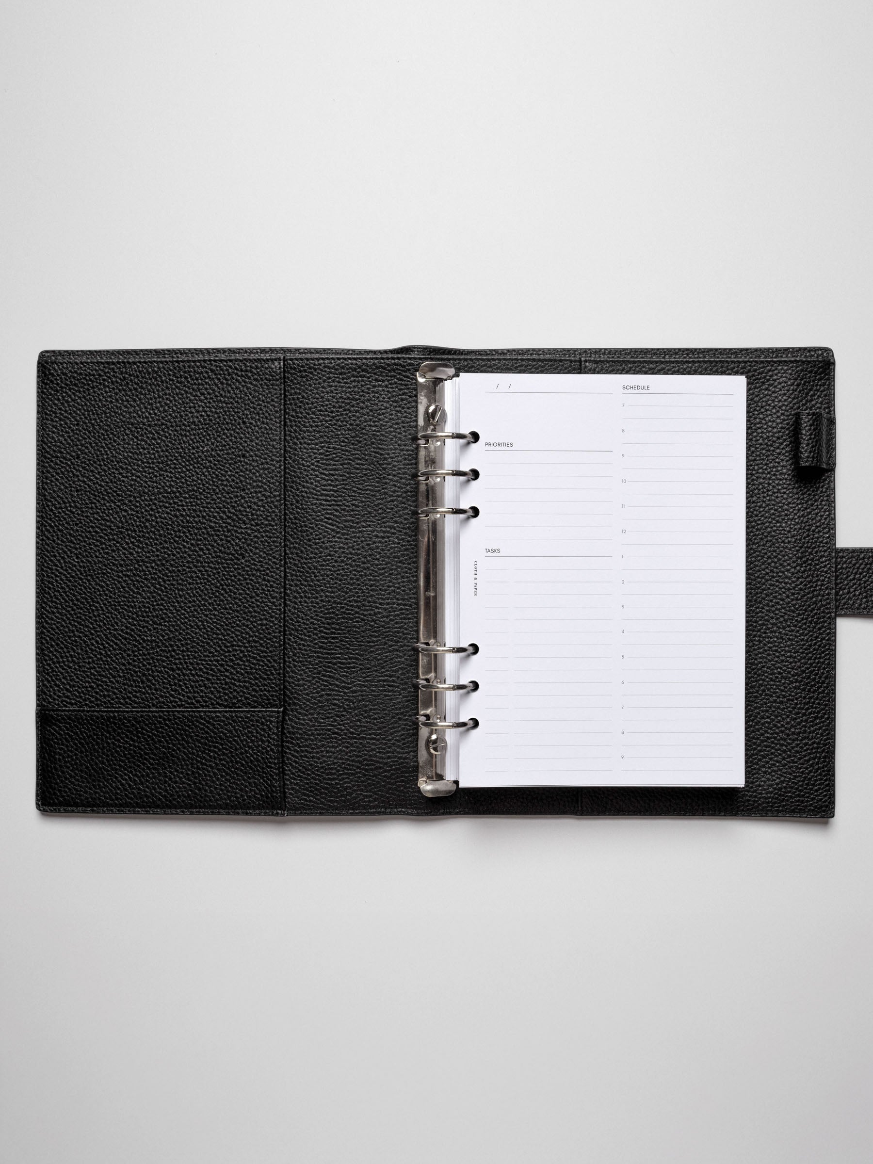 A5 insert in use inside a leather planner.