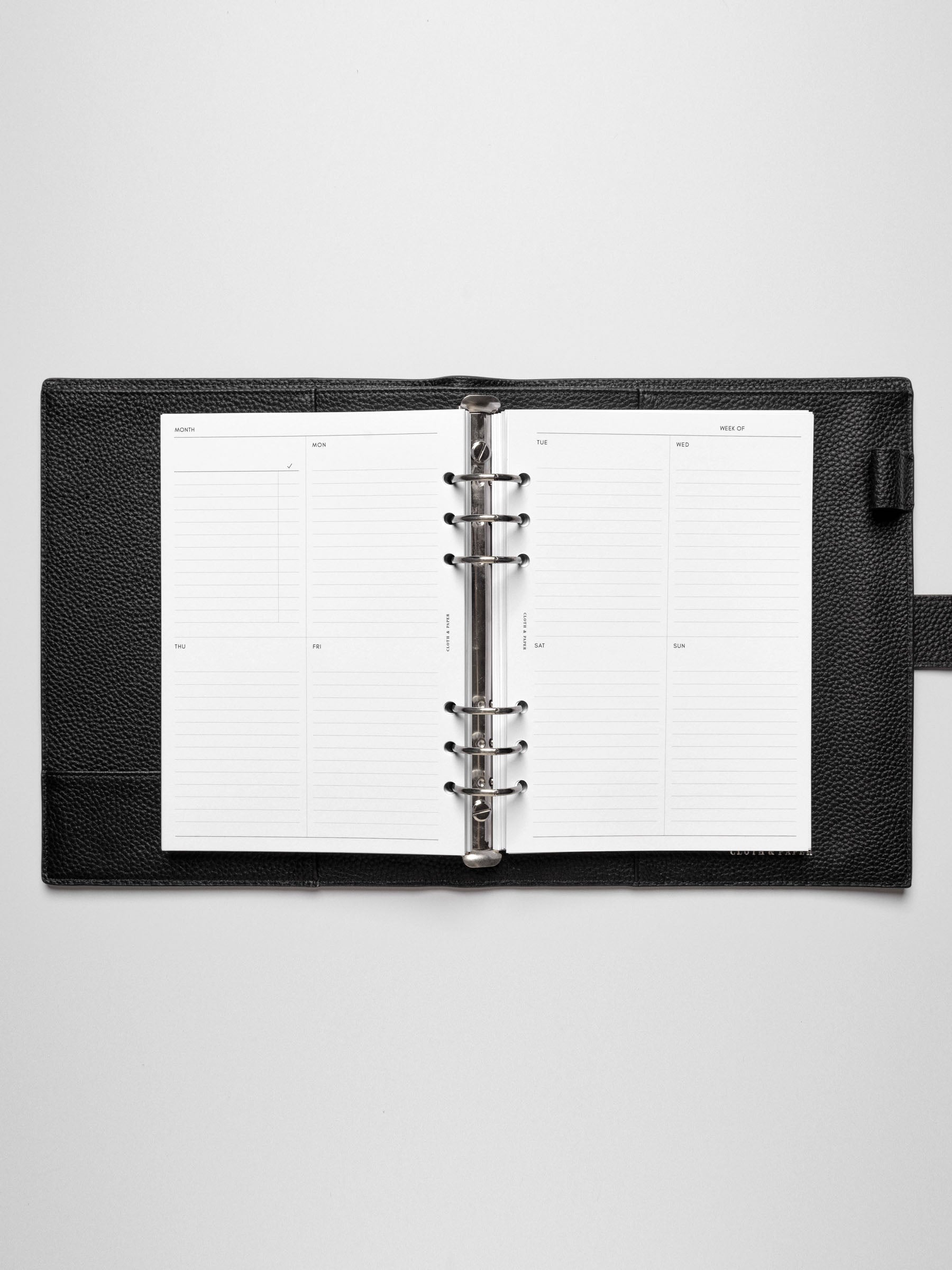 A5 insert in use inside a leather planner.