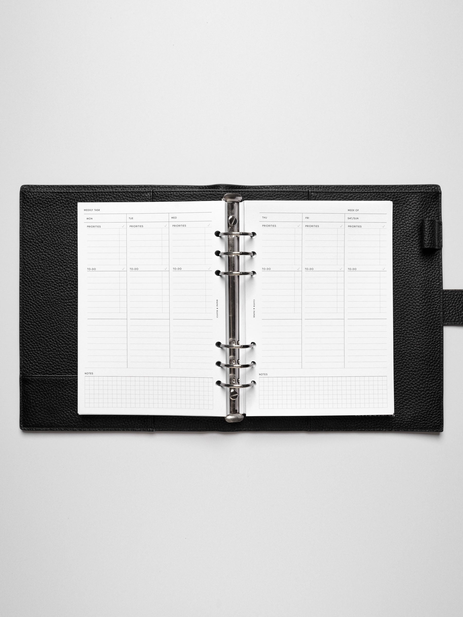 A5 insert in use inside a leather planner.