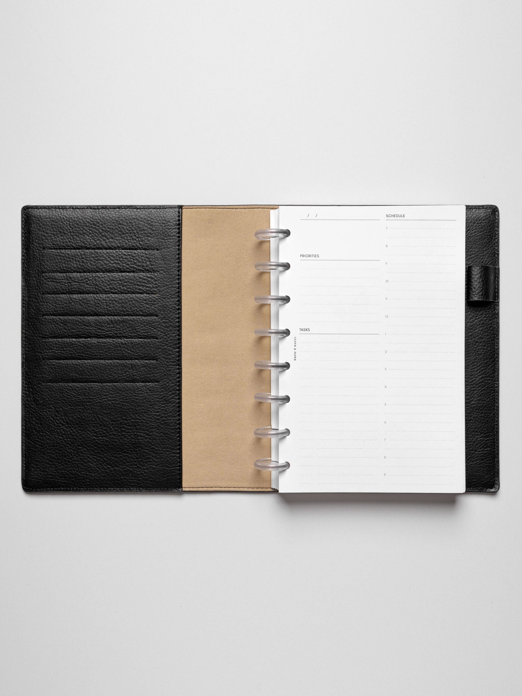 Half Letter insert in use inside a leather planner.