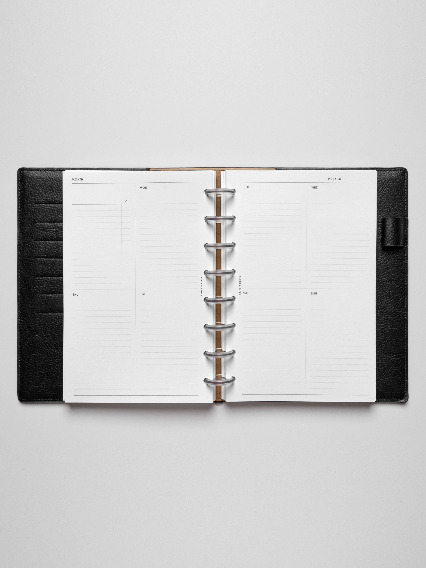 Half Letter insert in use inside a leather planner.