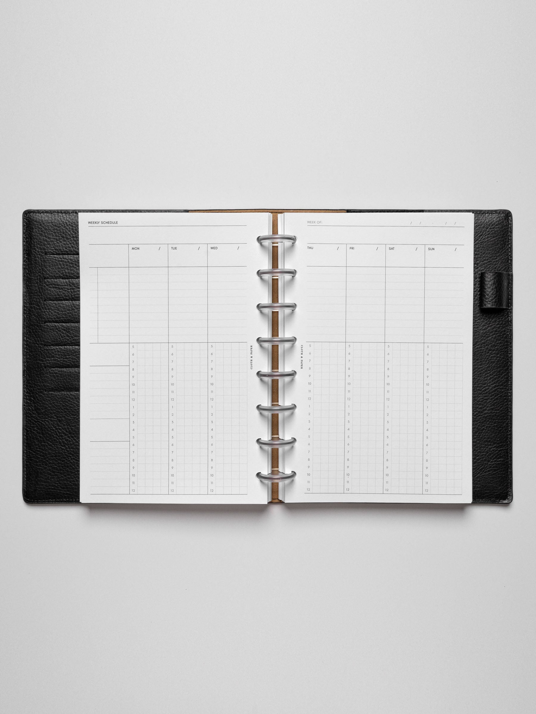 Half Letter insert in use inside a leather planner.