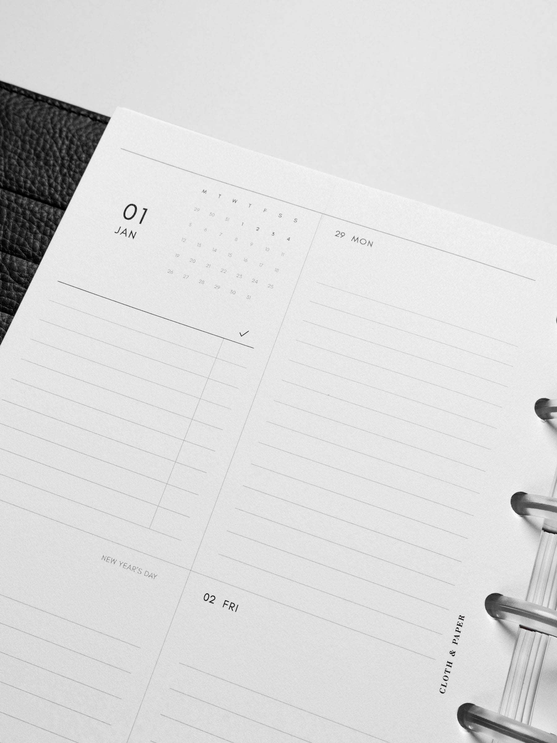 Image shows the 2026 Dated Vertical Weekly Planner Inserts used in a Half Letter disc-bound planner.