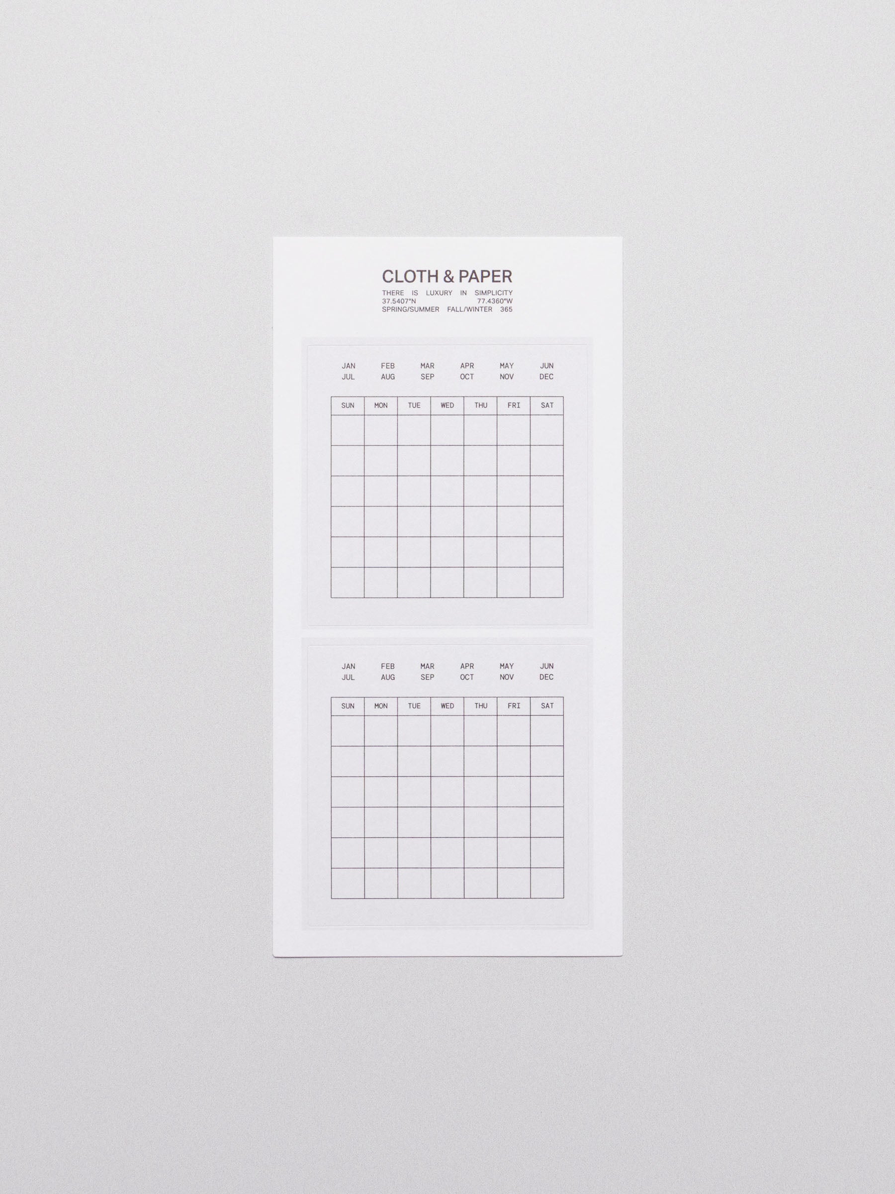 Calendar stickers displayed on a neutral background.