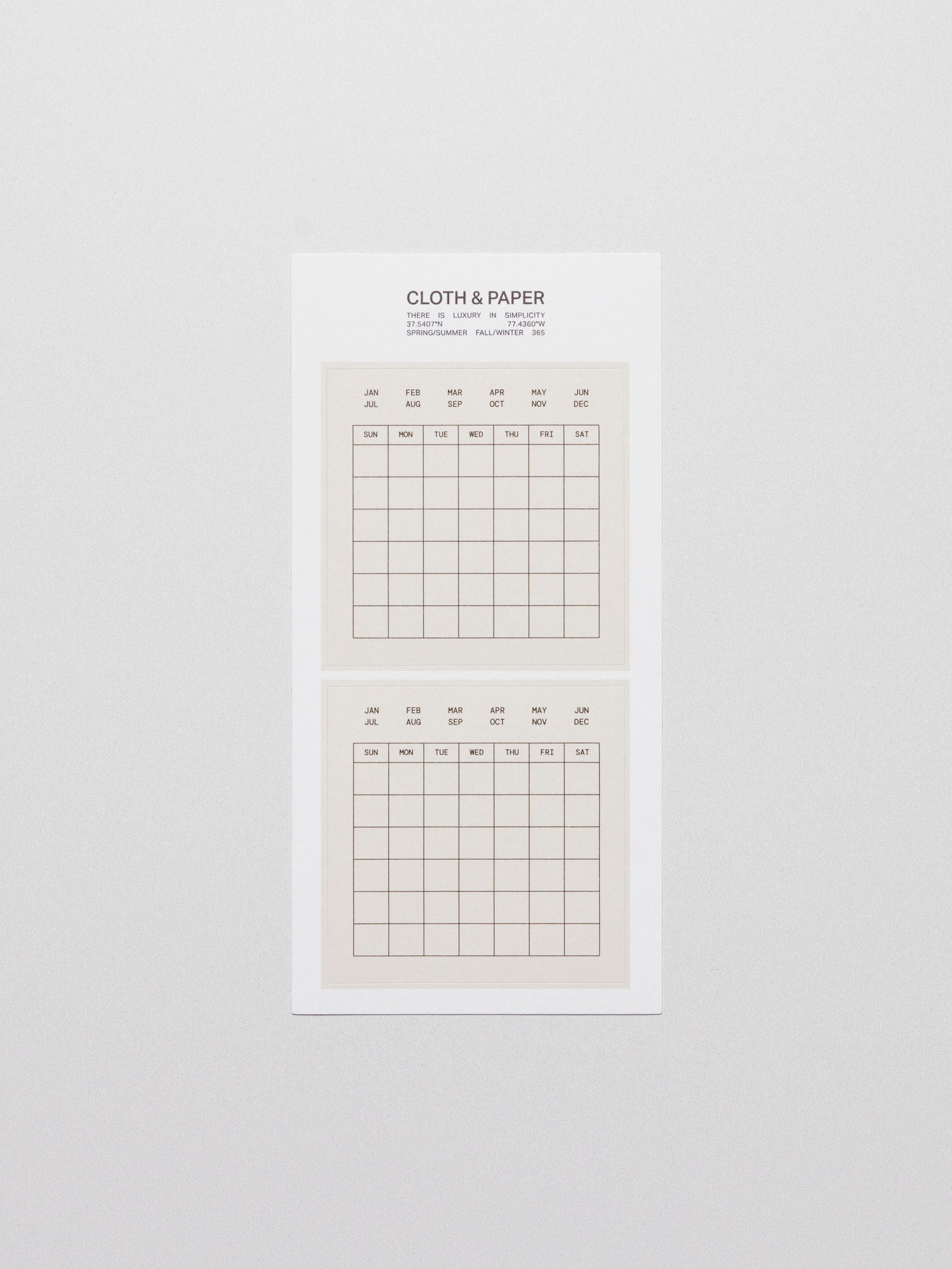 Calendar stickers displayed on a neutral background.