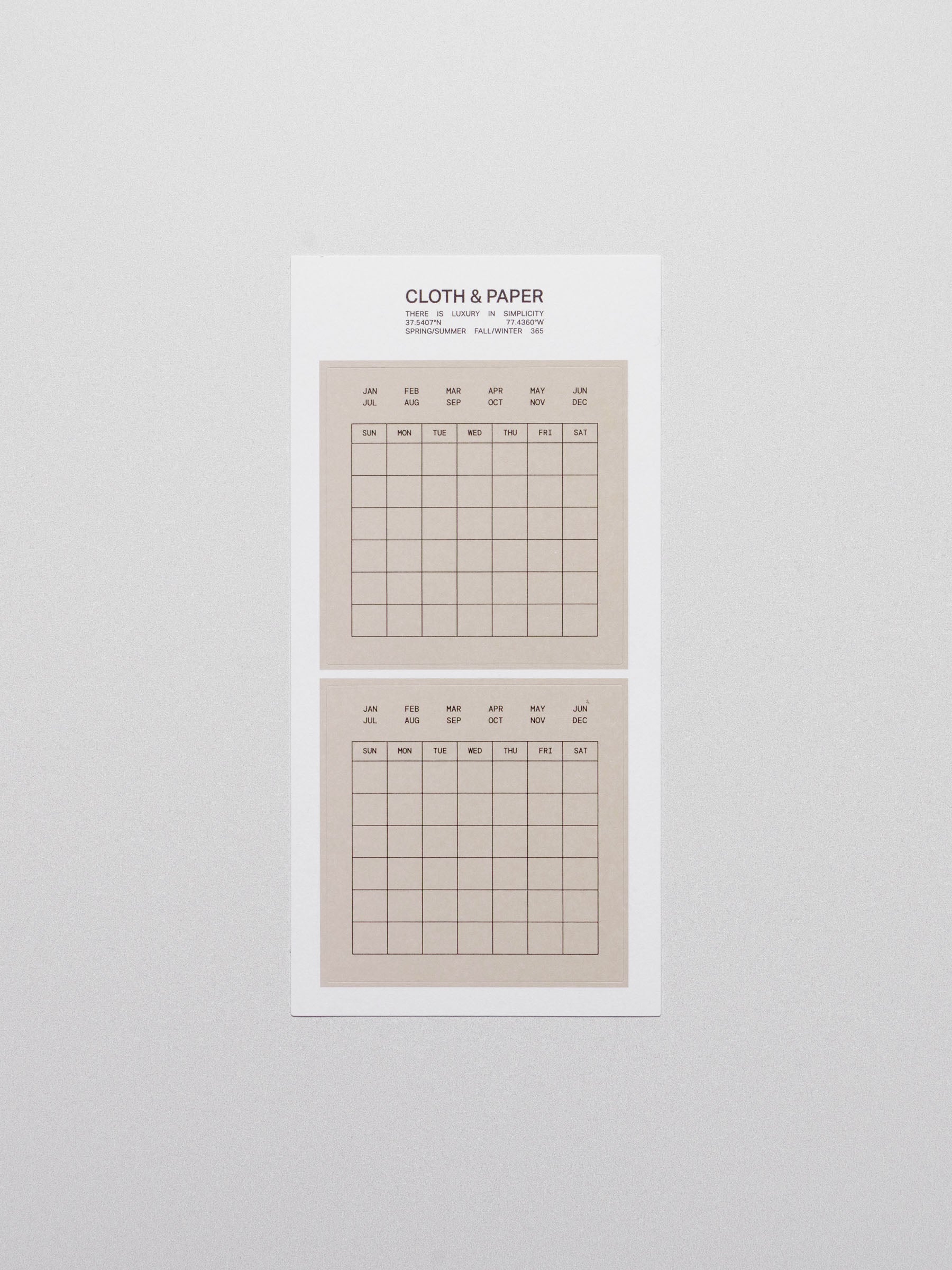 Calendar stickers displayed on a neutral background.