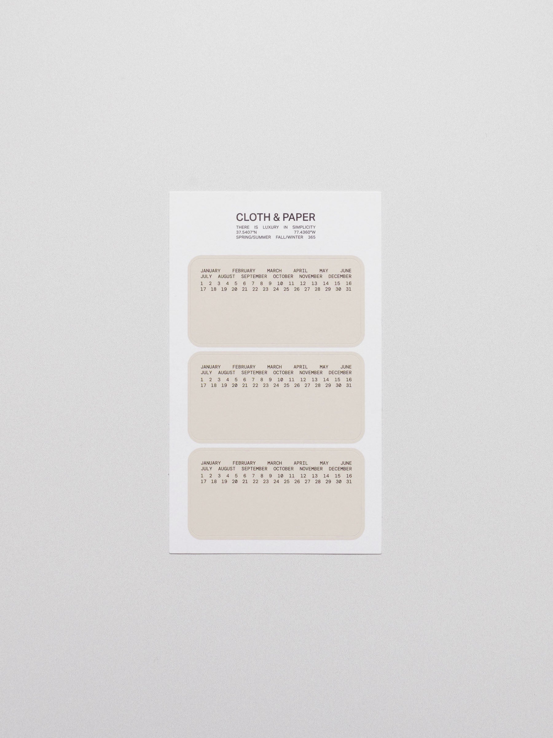 Undated calendar stickers displayed on a neutral background.