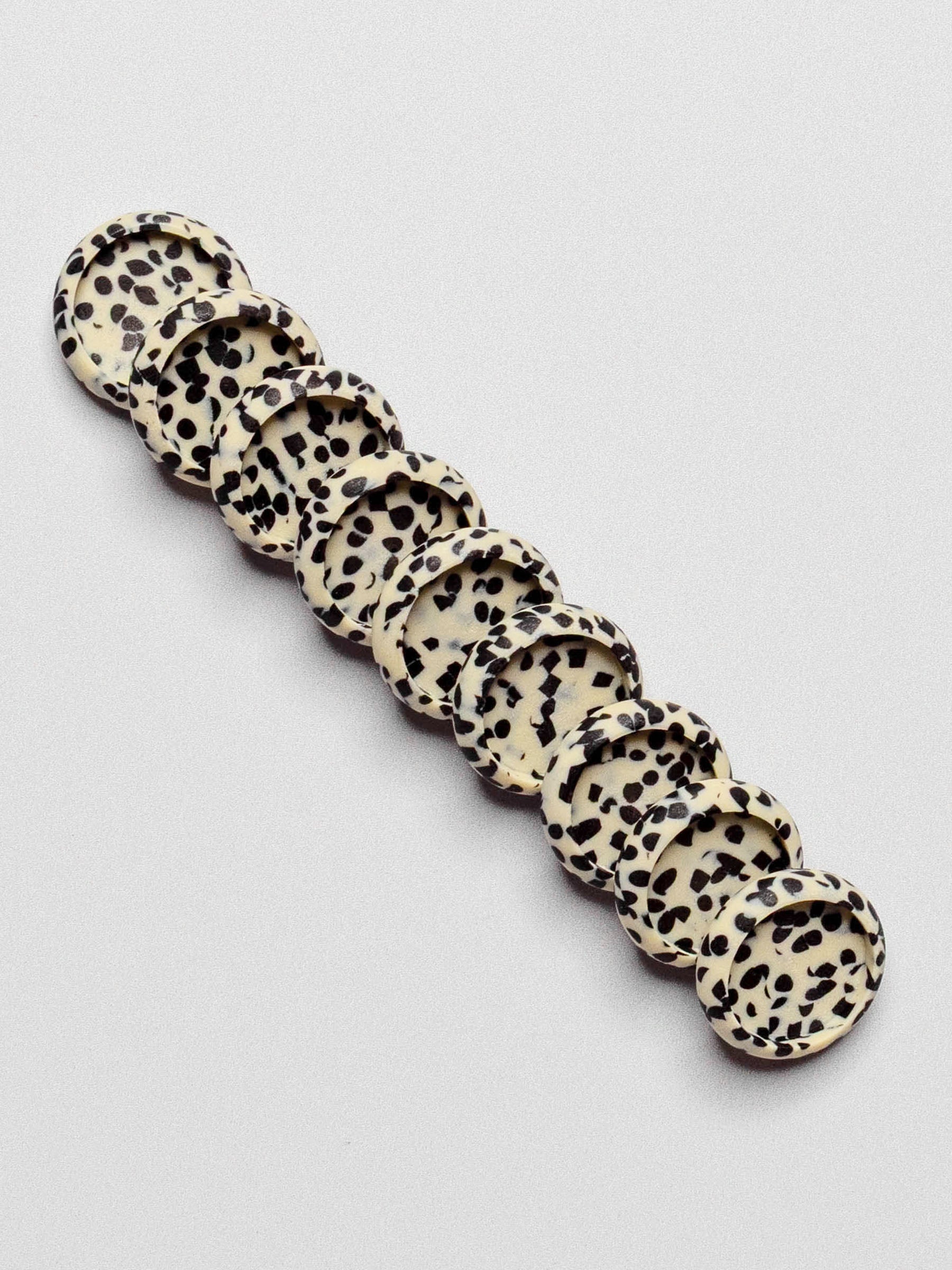 Set of nine discs displayed on a neutral background. Size shown is 0.75 inches.