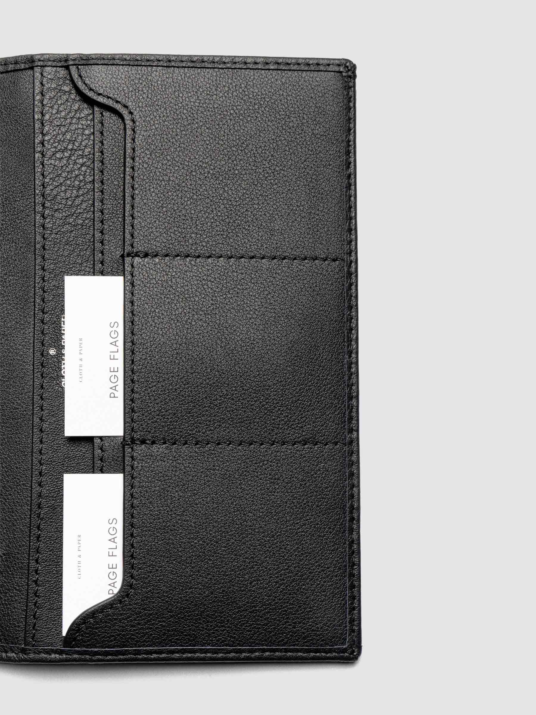 Close-up of Nomada Wallet credit card slots in Padrillo with page flags tucked inside