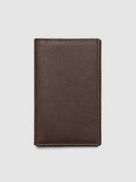 Nomada Wallet in Cordoba closed, showing rich brown Spanish leather exterior
