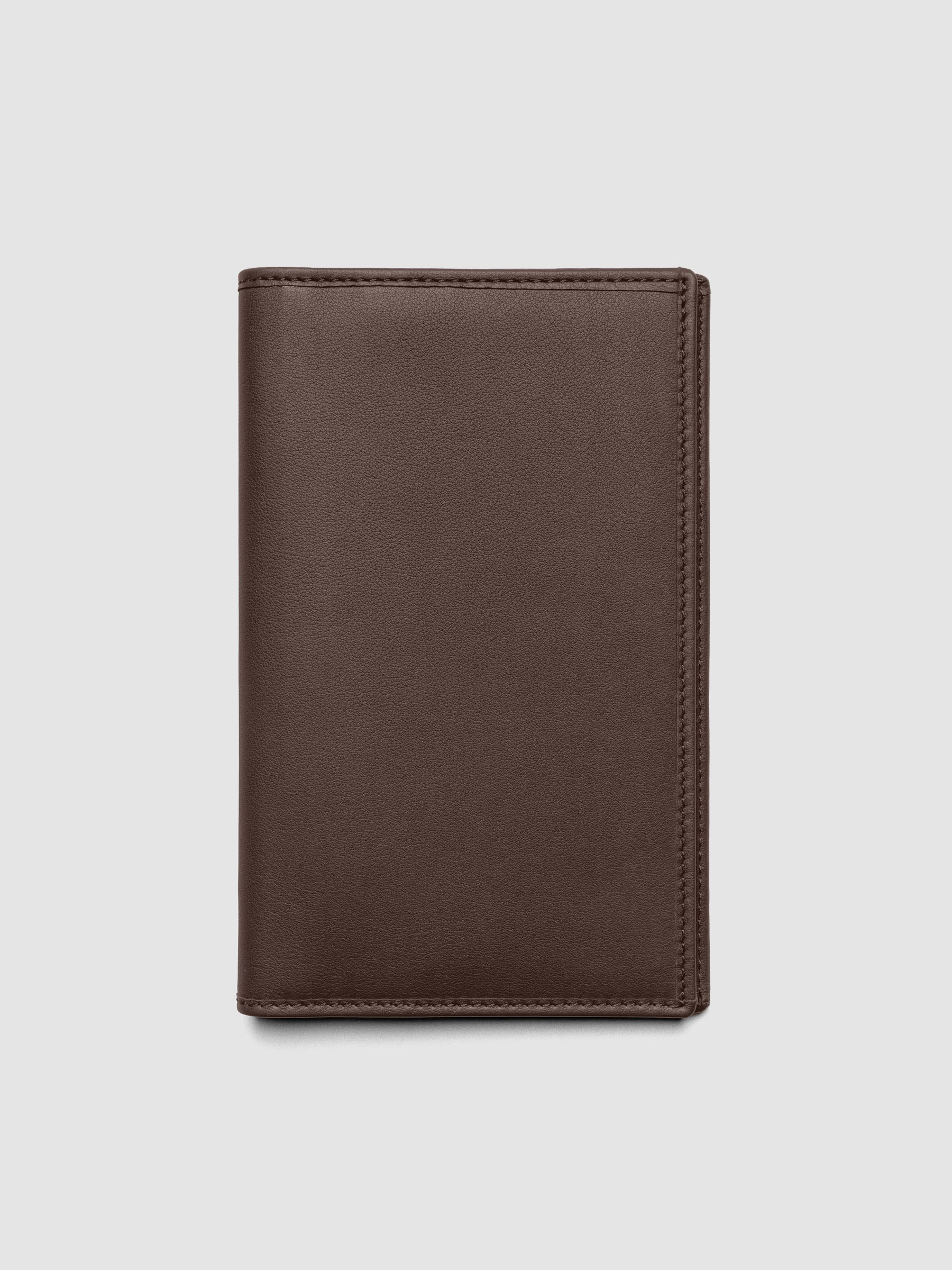 Nomada Wallet in Cordoba closed, showing rich brown Spanish leather exterior