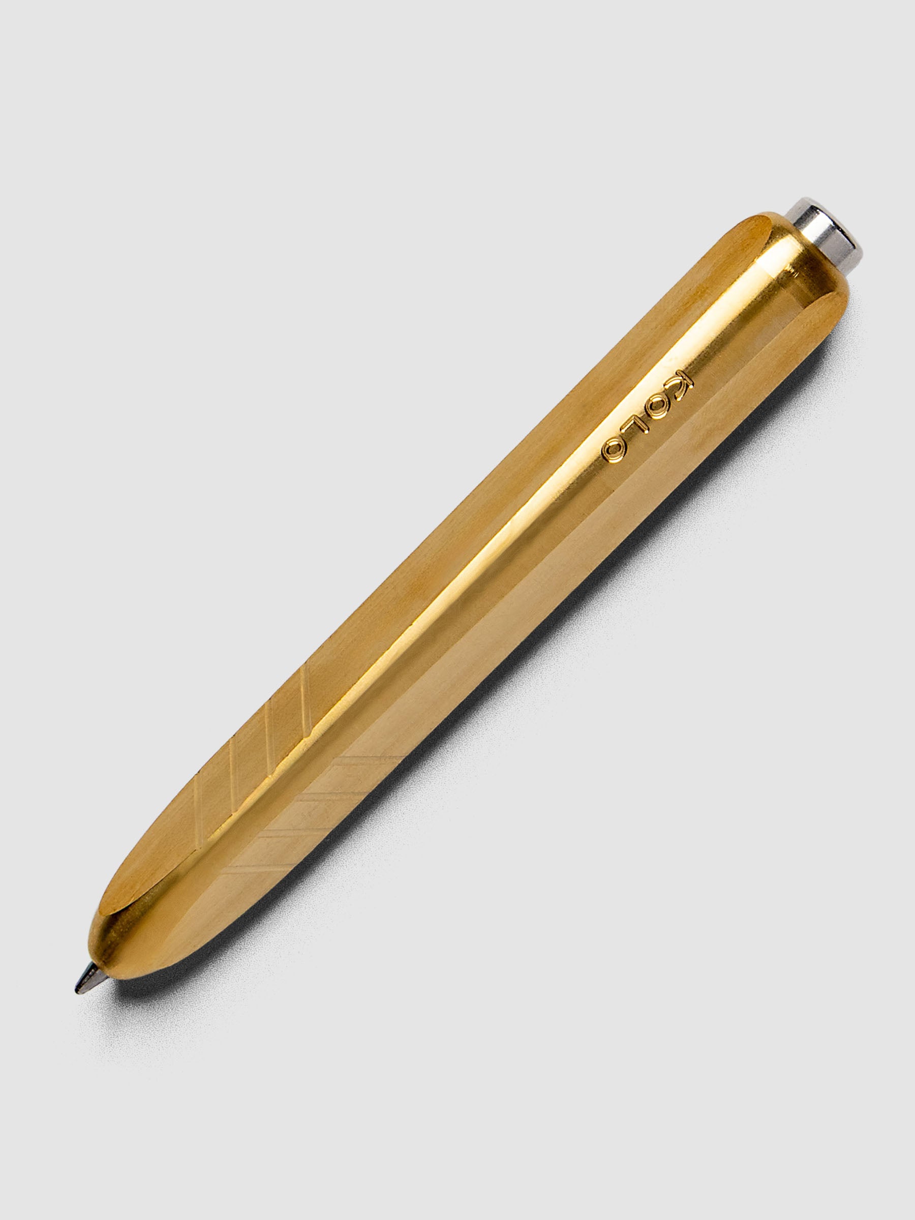 Kolo Tino Ballpoint Pen in option Raw Brass with a warm metal barrel.