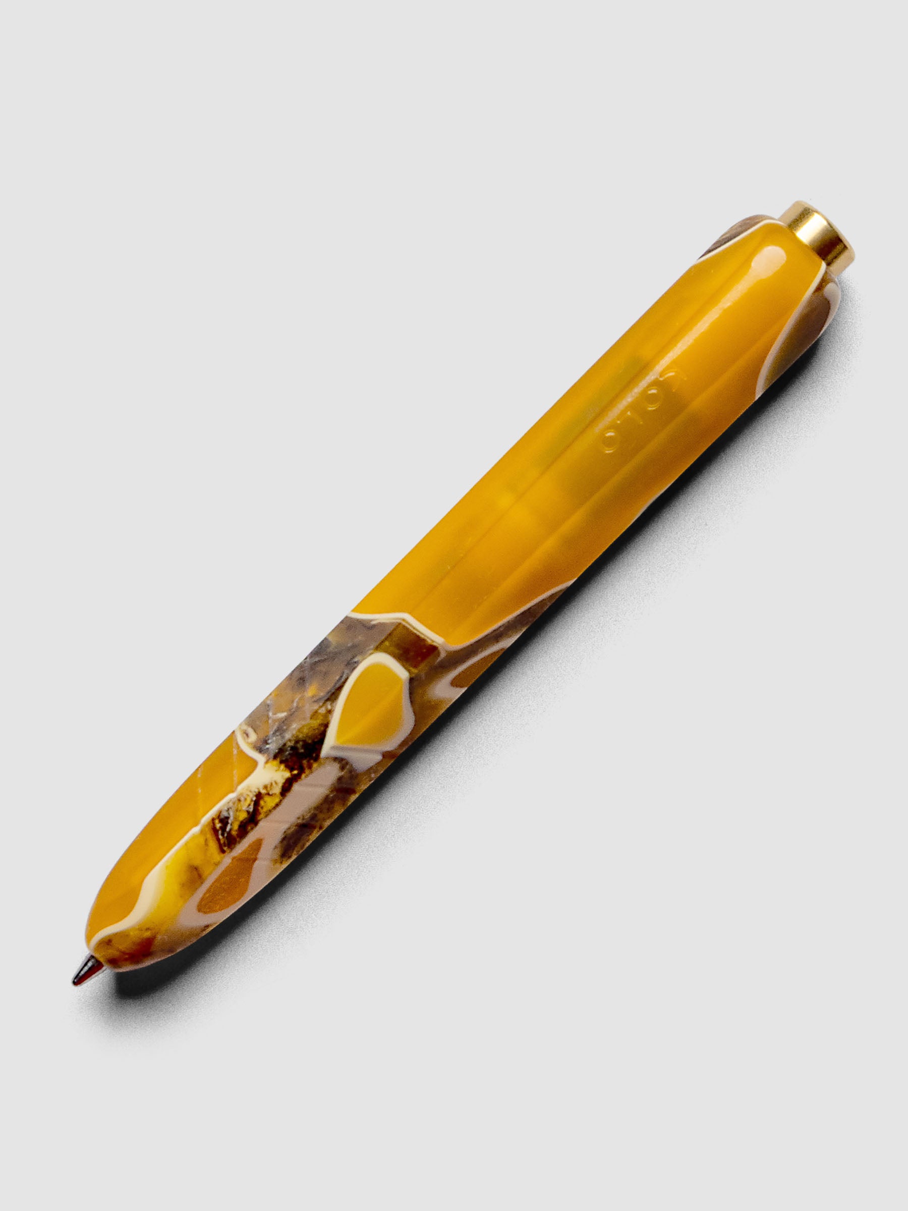 Kolo Tino Ballpoint Pen in option Dune with a variegated yellow, brown, and beige body.