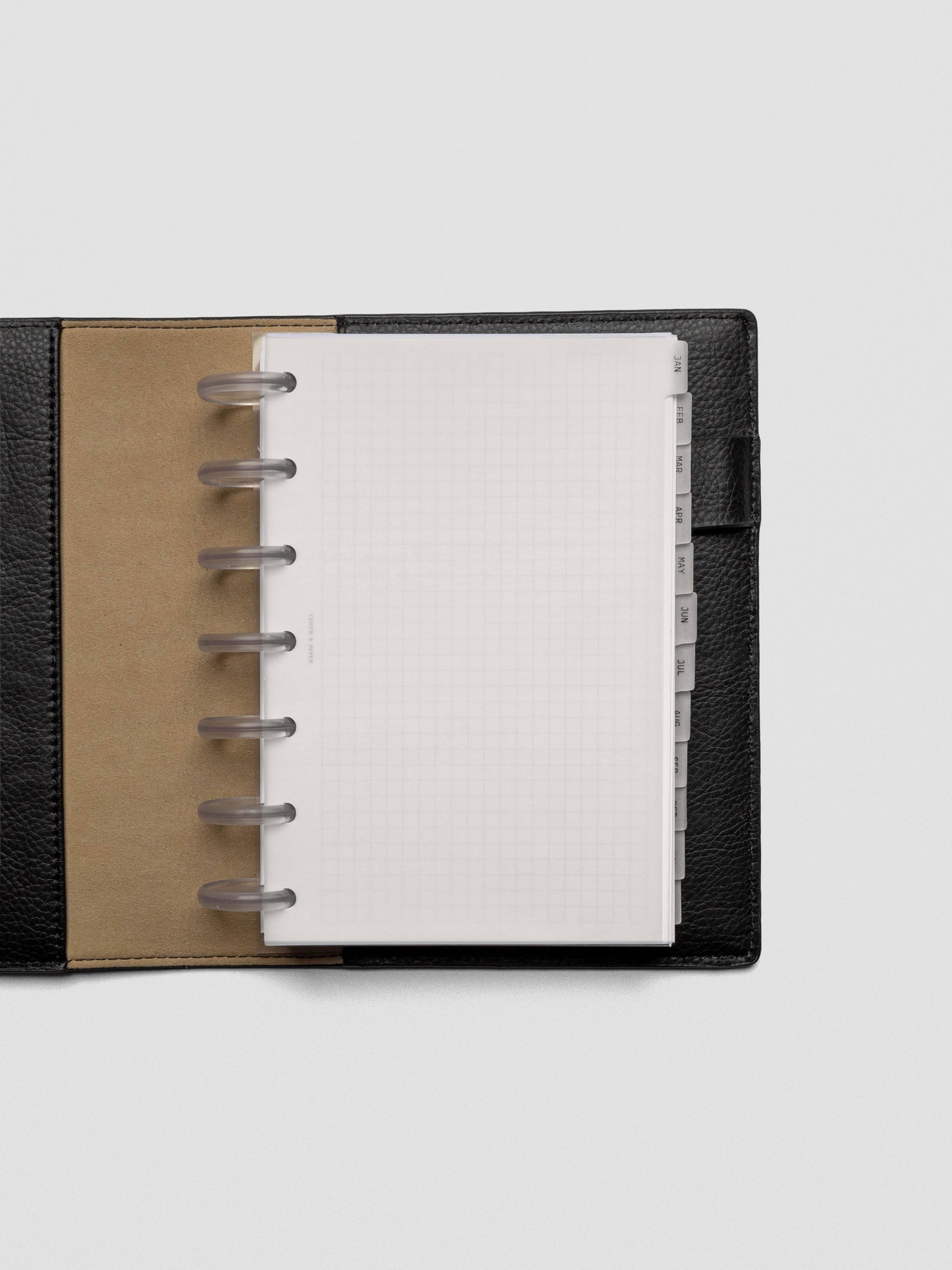 HP Mini vellum dividers shown bound with rings in an agenda.