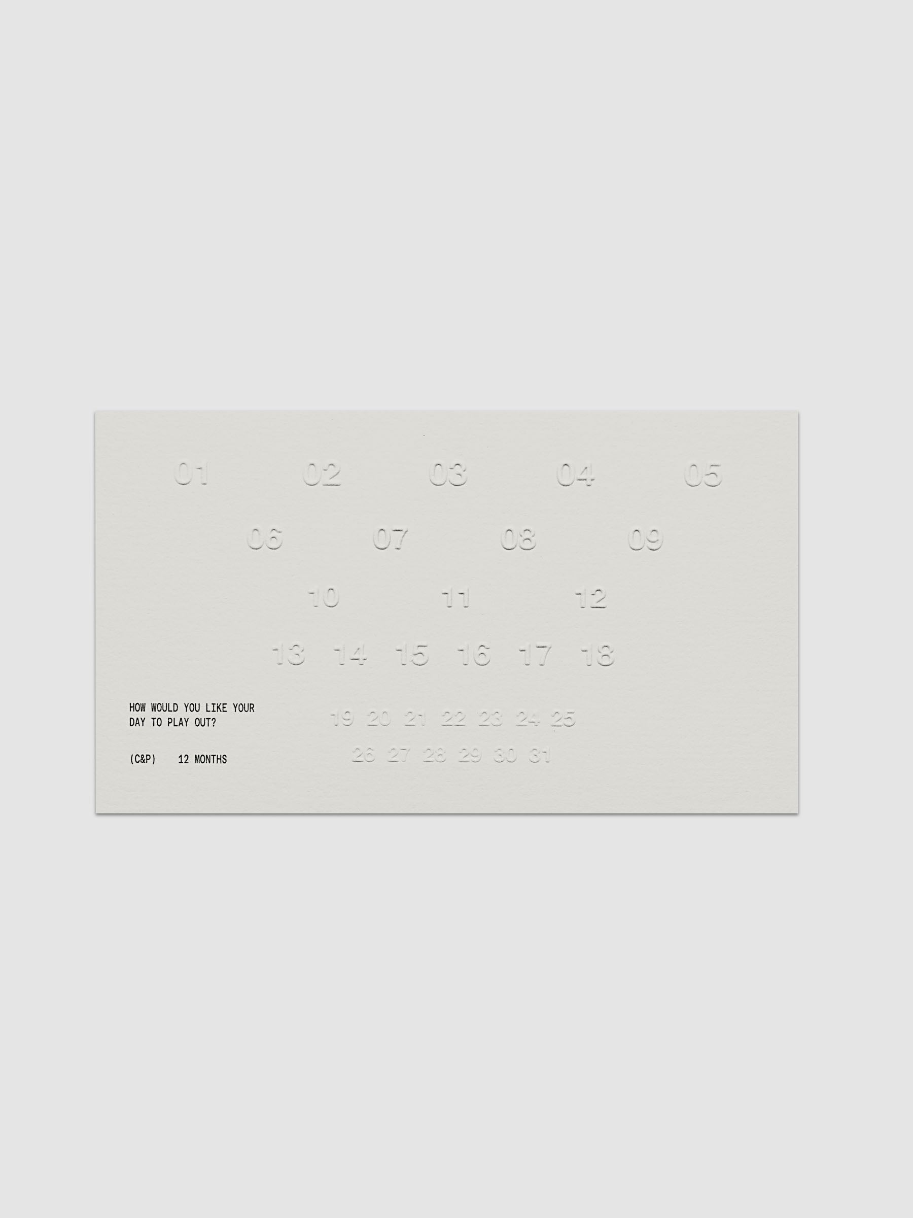 Off-white embossed journaling card counting from one to thirty-one with black text