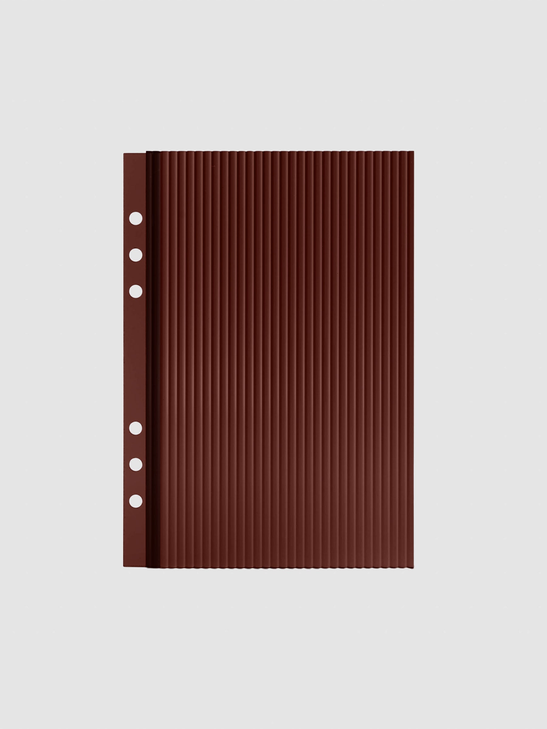 Bordeaux fluted planner dashboard in A5 size, six ring punch, shown flat on a grey background.