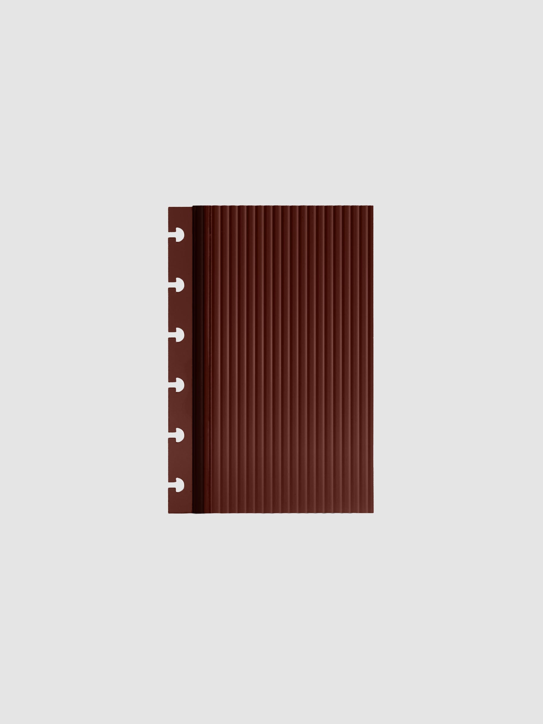Bordeaux fluted planner dashboard in CP Petite size, six disc punch, shown flat on a grey background.