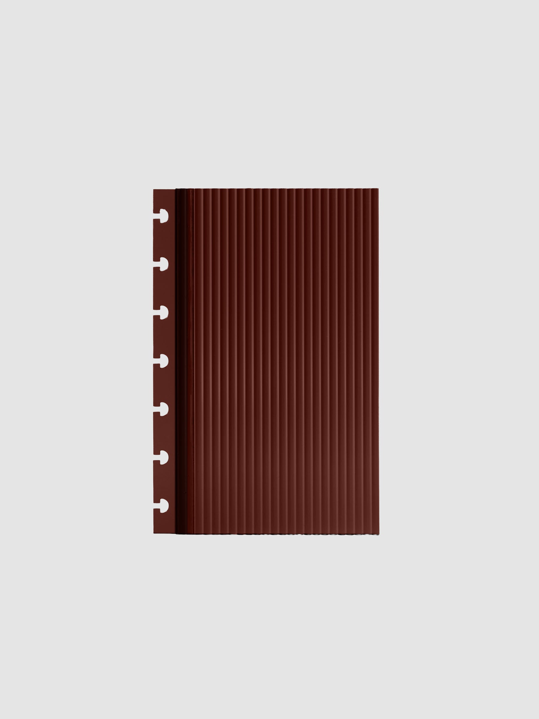Bordeaux fluted planner dashboard in HP Mini size, seven disc punch, shown flat on a grey background.