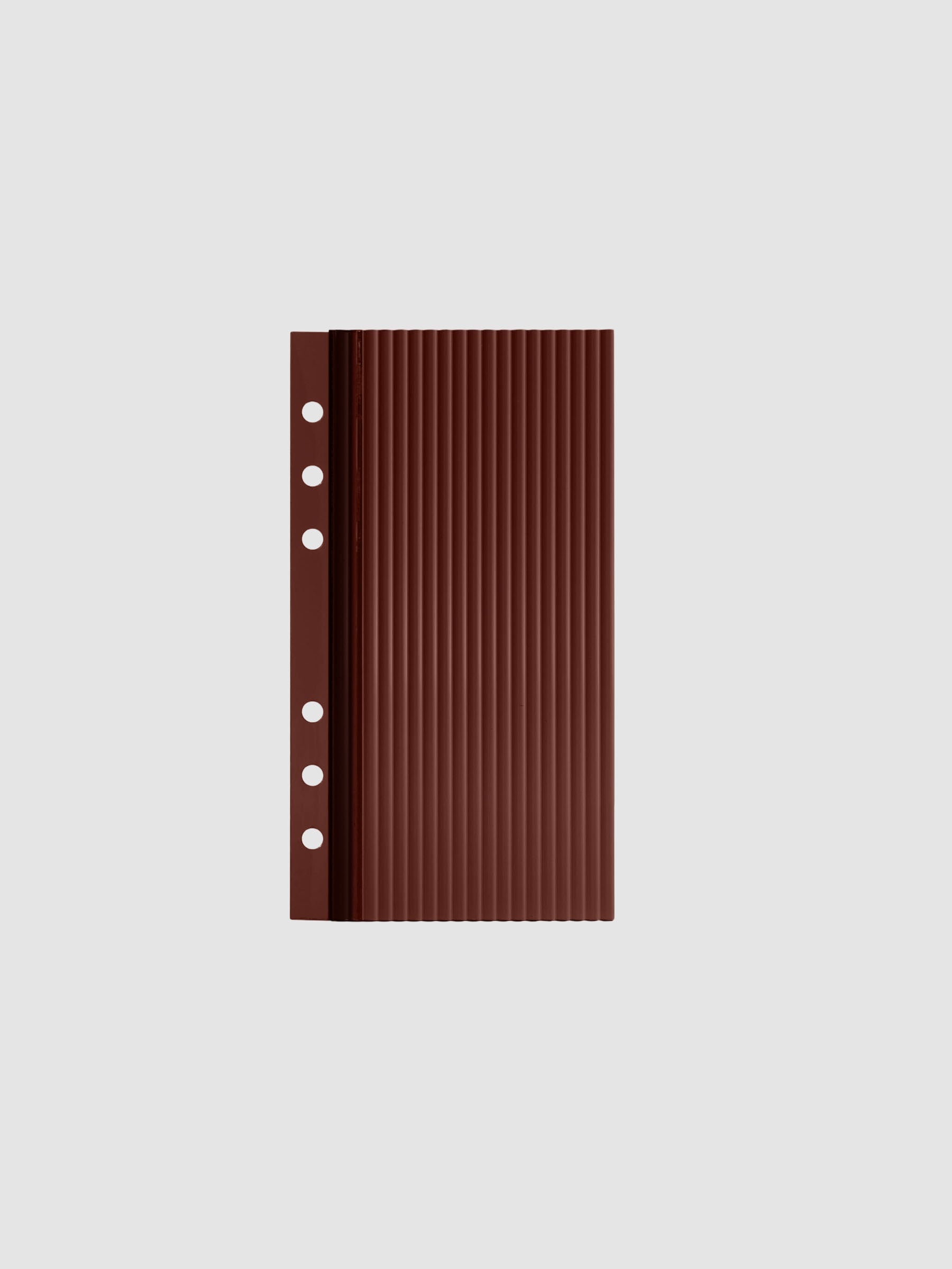 Bordeaux fluted planner dashboard in Personal size, six ring punch, shown flat on a grey background.