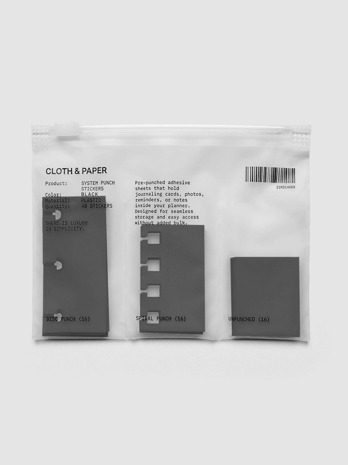 System Punch Stickers in Avant Garde, disc punch pack with disc punch, spiral punch and unpunched adhesive stickers in a zip bag