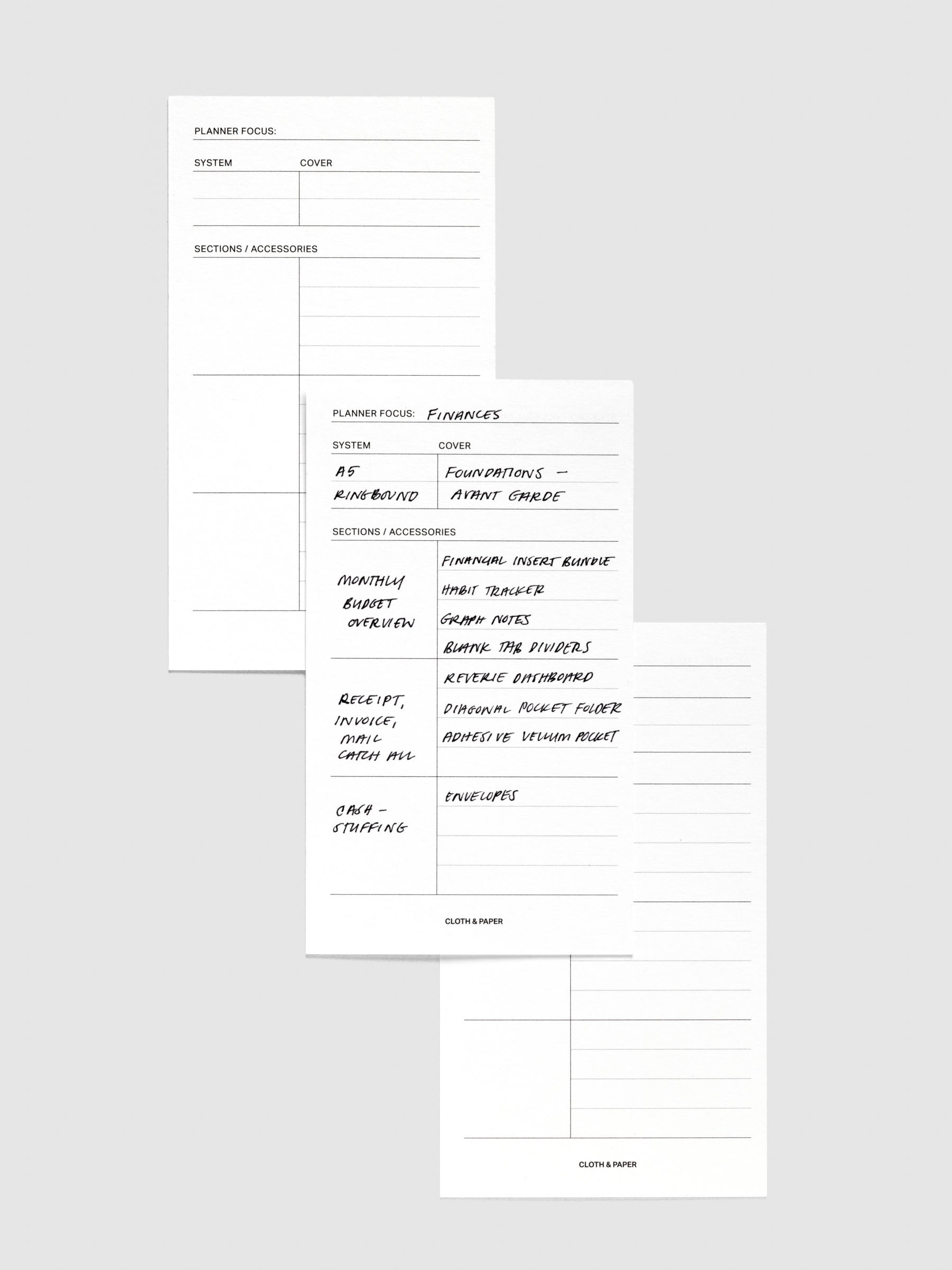Set of three Planner System Cards with one filled with handwritten notes as an example.