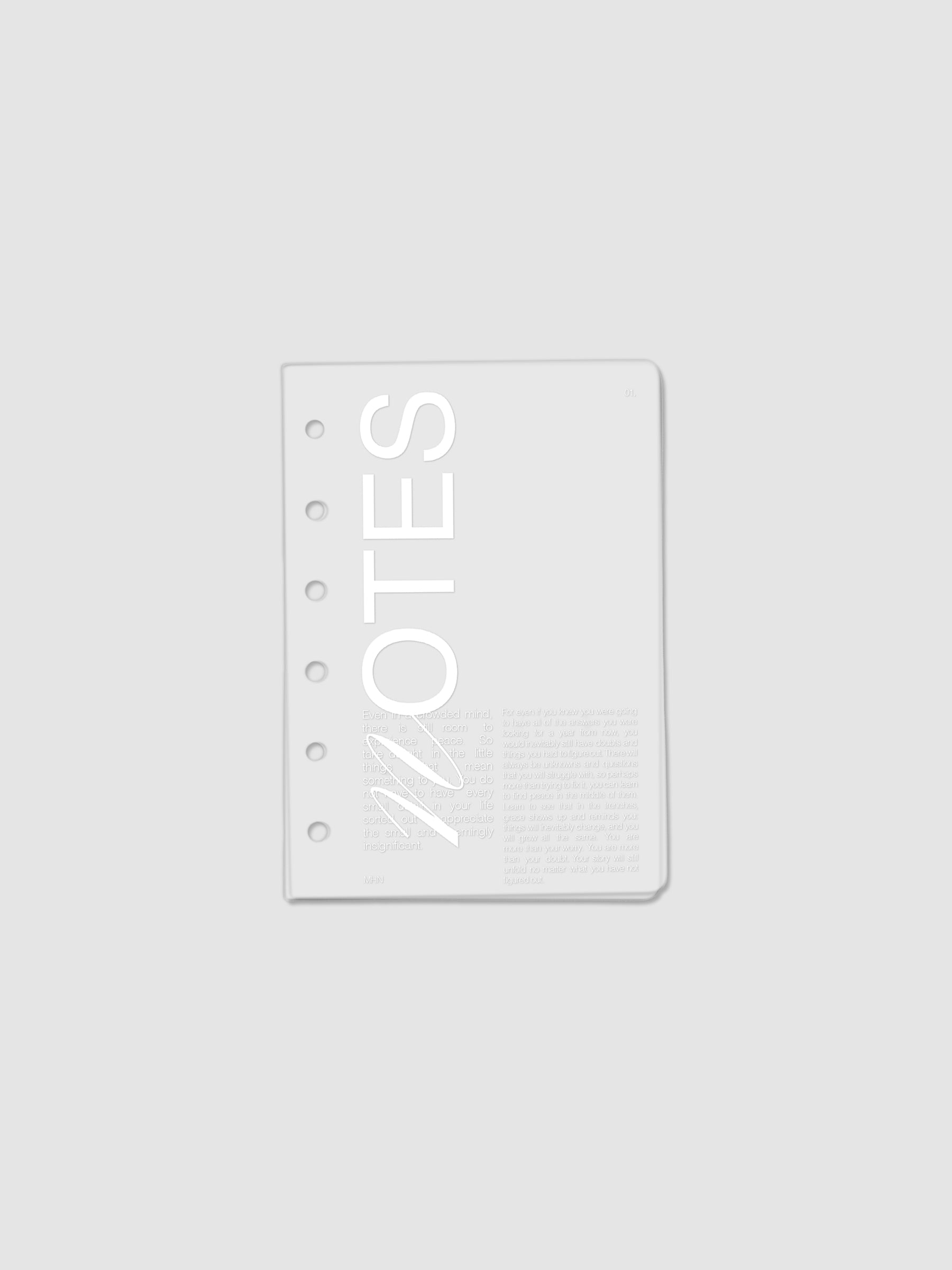 Clear plastic planner cover with white printed text shown pre-punched for Pocket 6-ring planners.