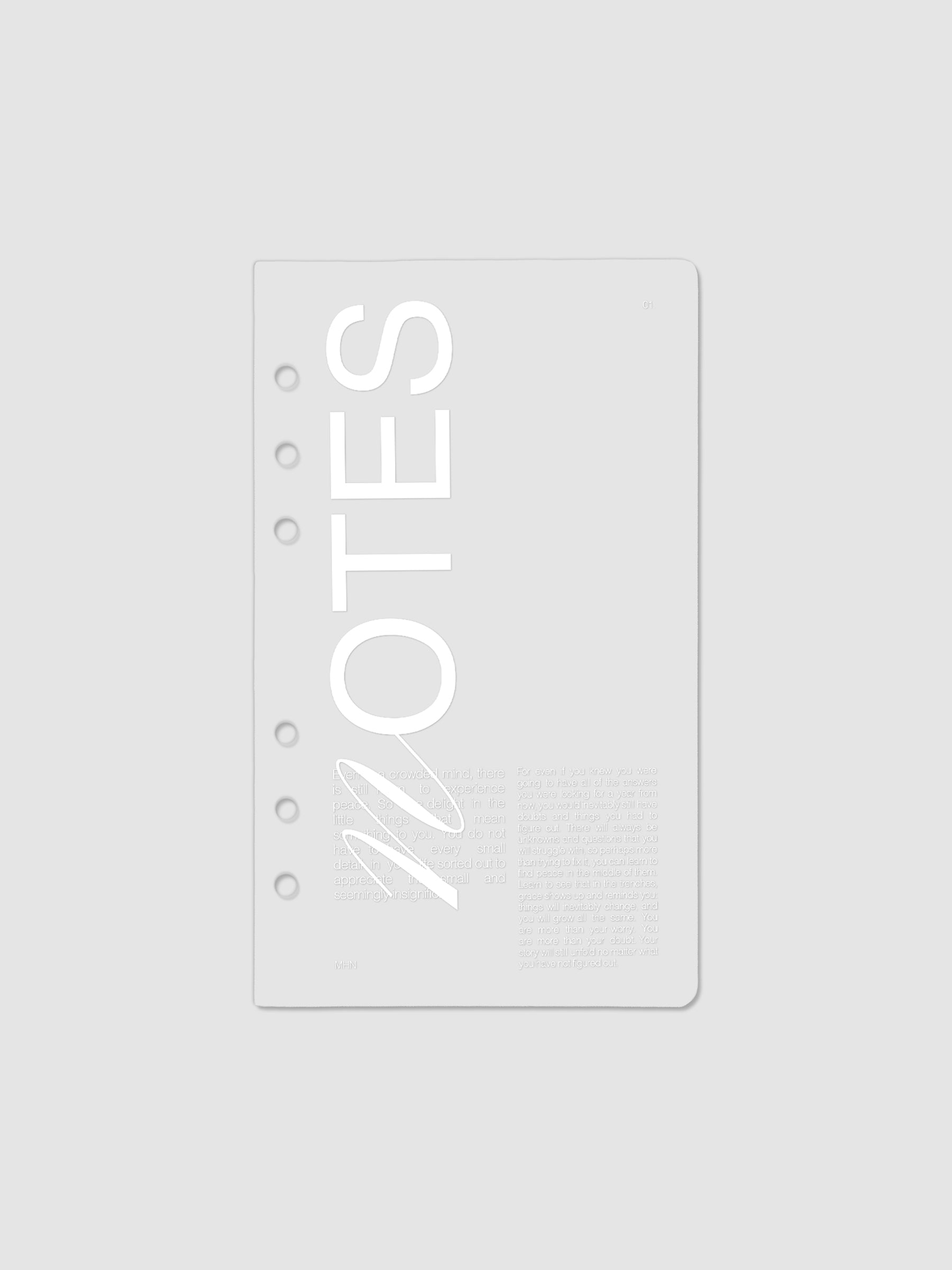 Clear plastic planner cover with white printed text shown pre-punched for Personal 6-ring planners.