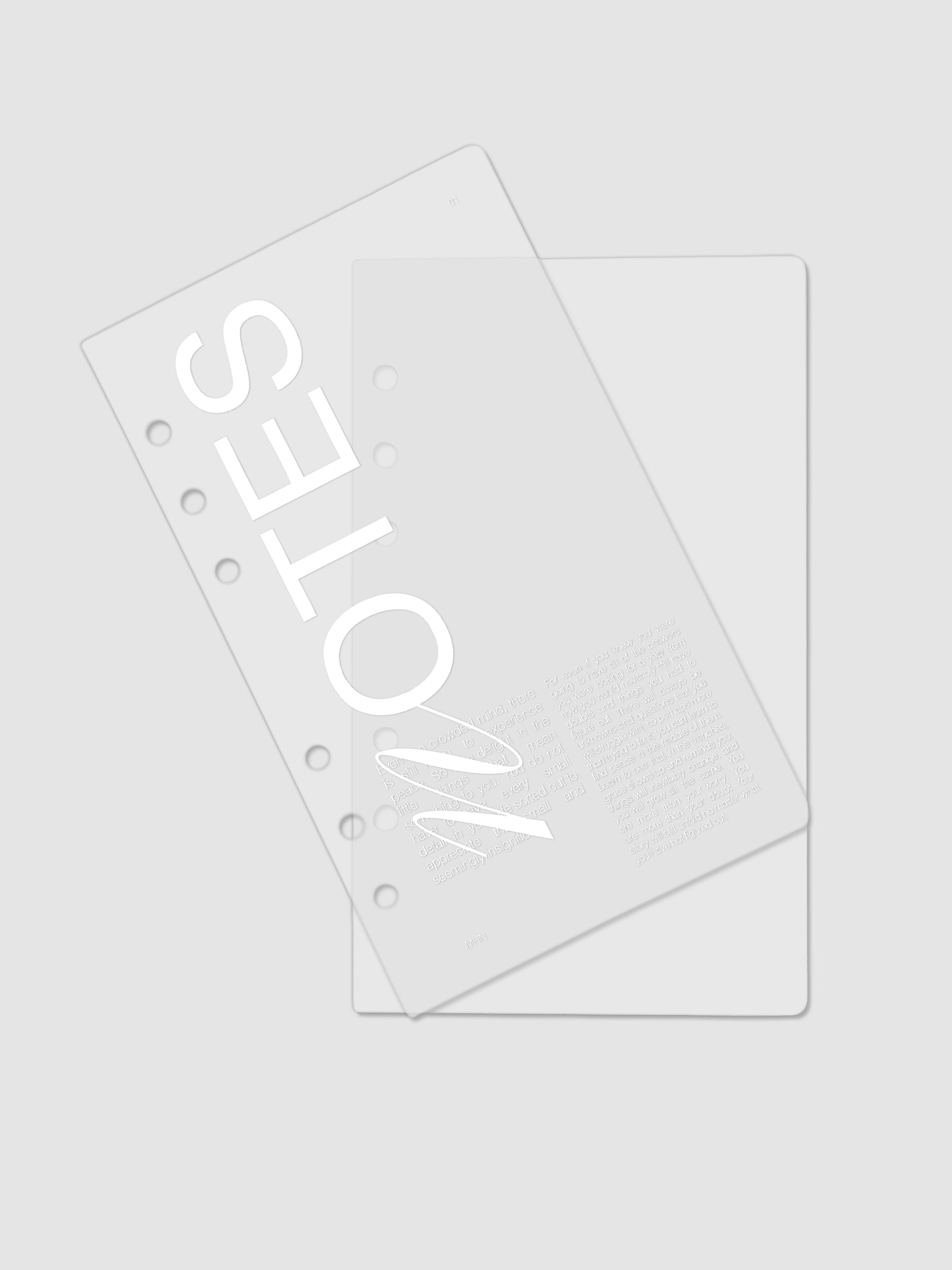 Clear plastic planner cover with white printed text shown pre-punched for Personal 6-ring planners.