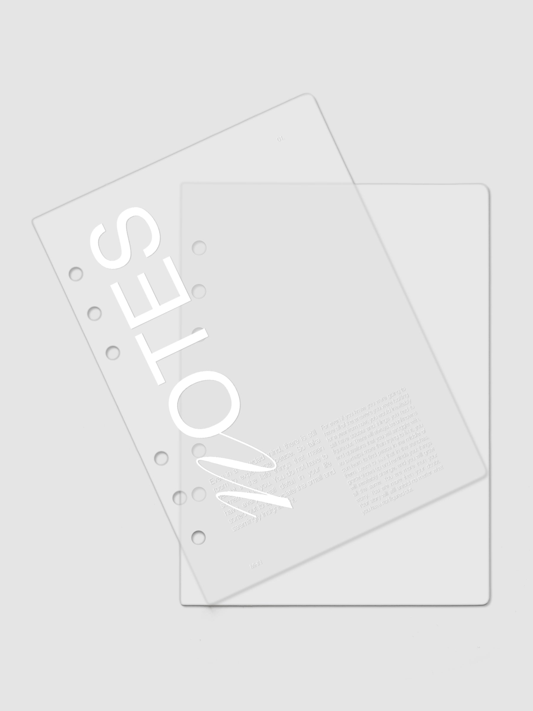 Clear plastic planner cover with white printed text shown pre-punched for Personal Wide 6-ring planners.