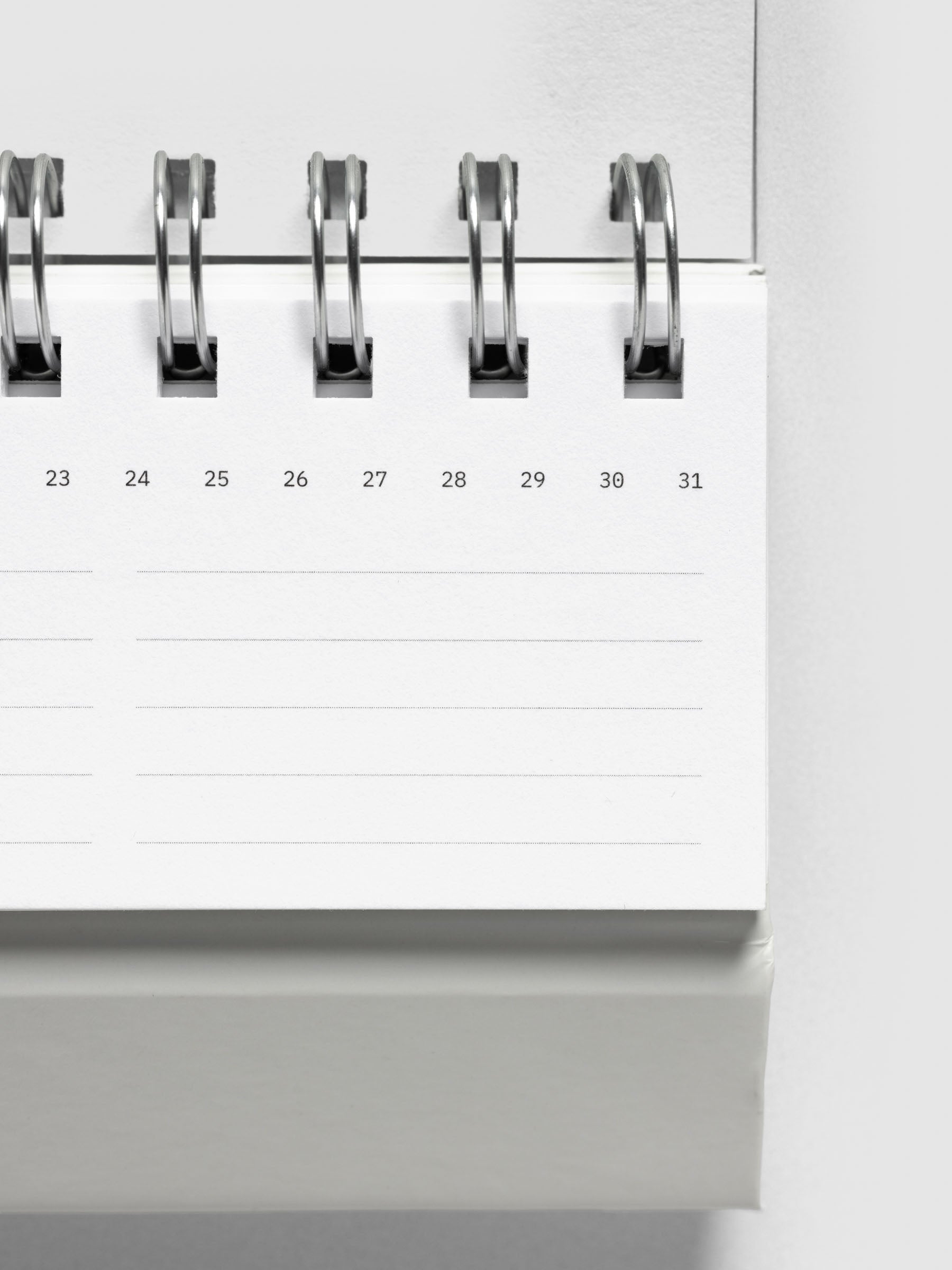 Close up of 2026 Spiral Desk Calendar shown folded and flat, displaying a calendar page.