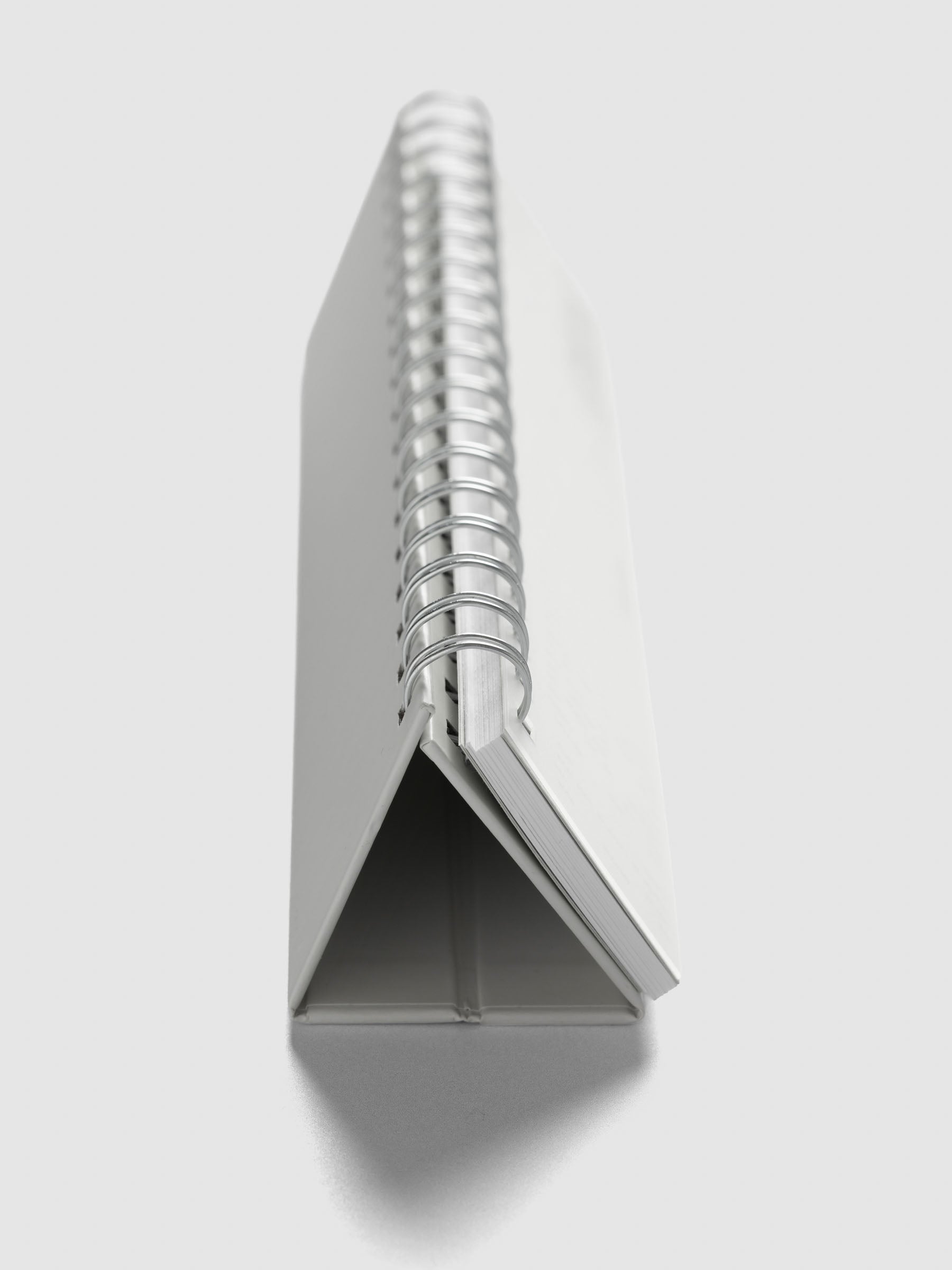 2026 Spiral Desk Calendar shown standing from the side.