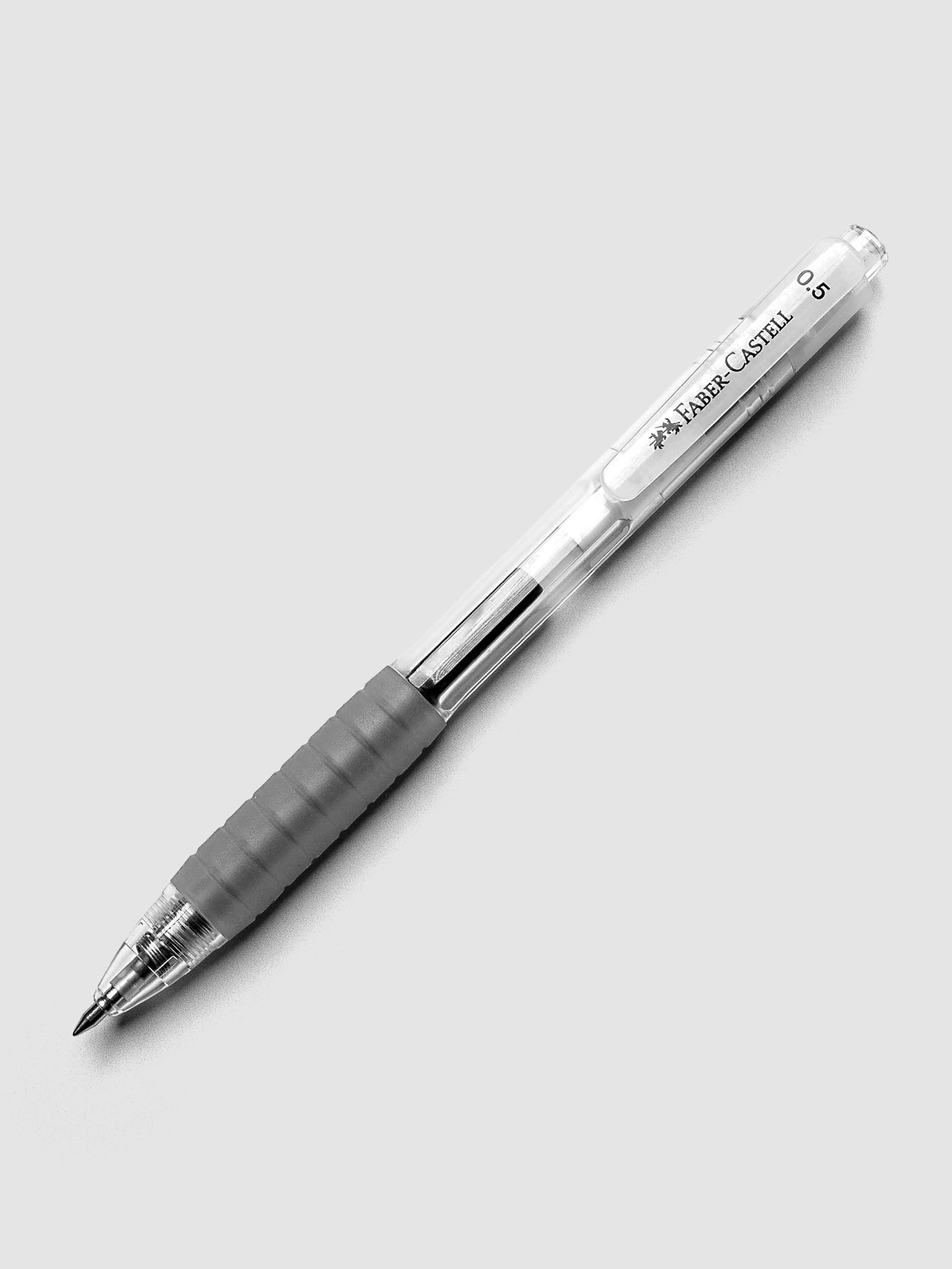 Faber Castell Fast Gel Z Pen with a clear barrel and a grey grip shown with tip extended.