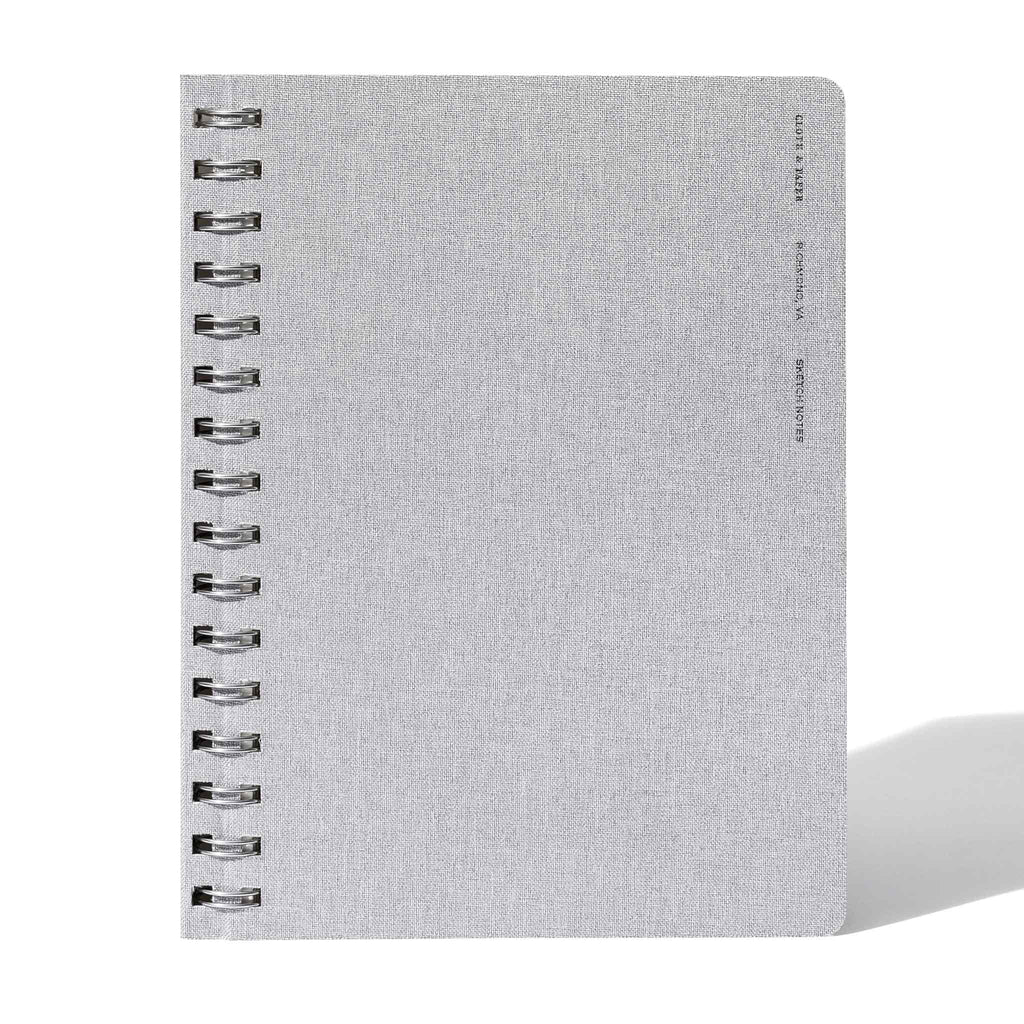 Linen notebook displayed on a white background.