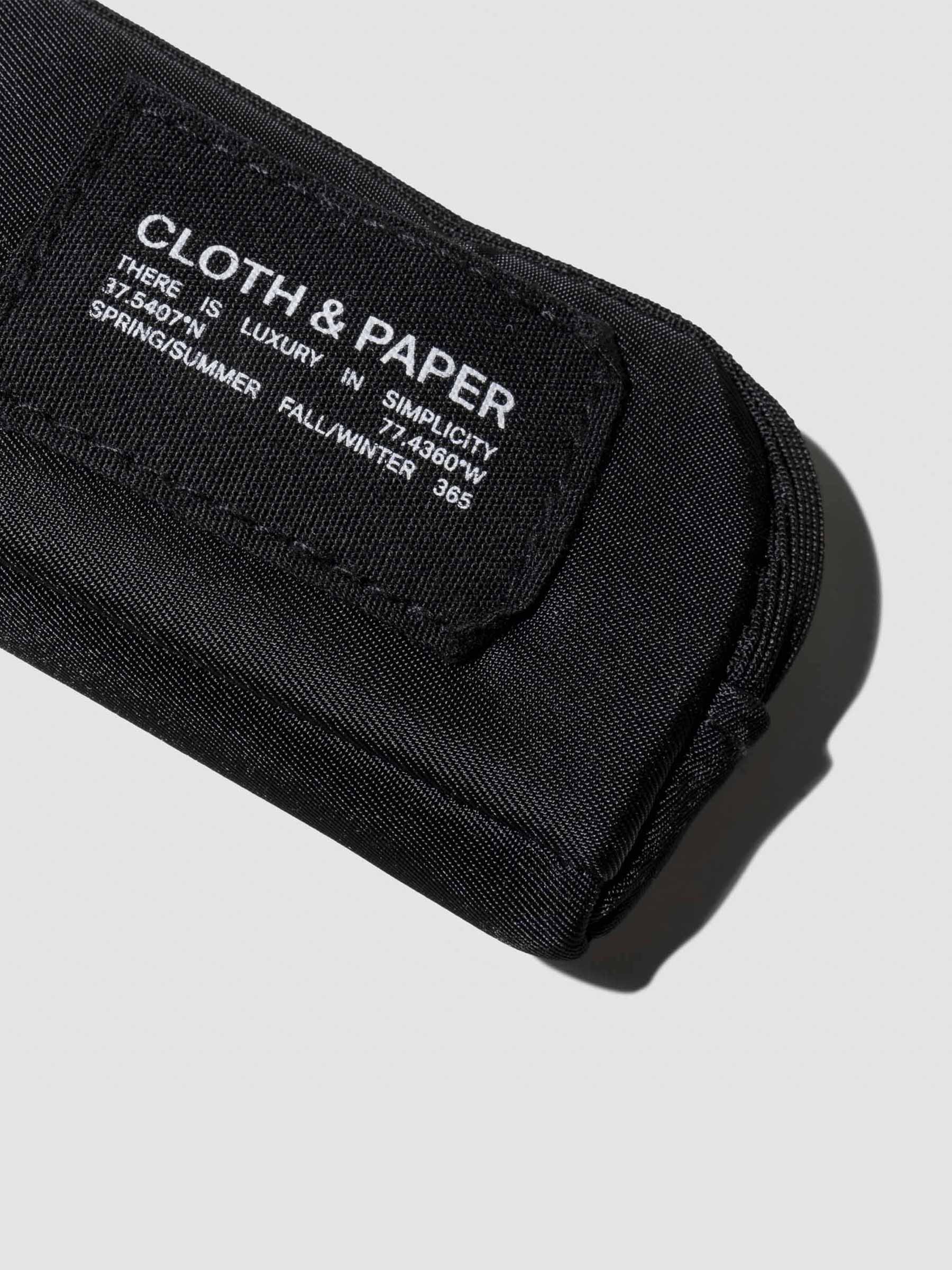 Closeup of Cloth and Paper tag on pouch. Color shown is Avant Garde.